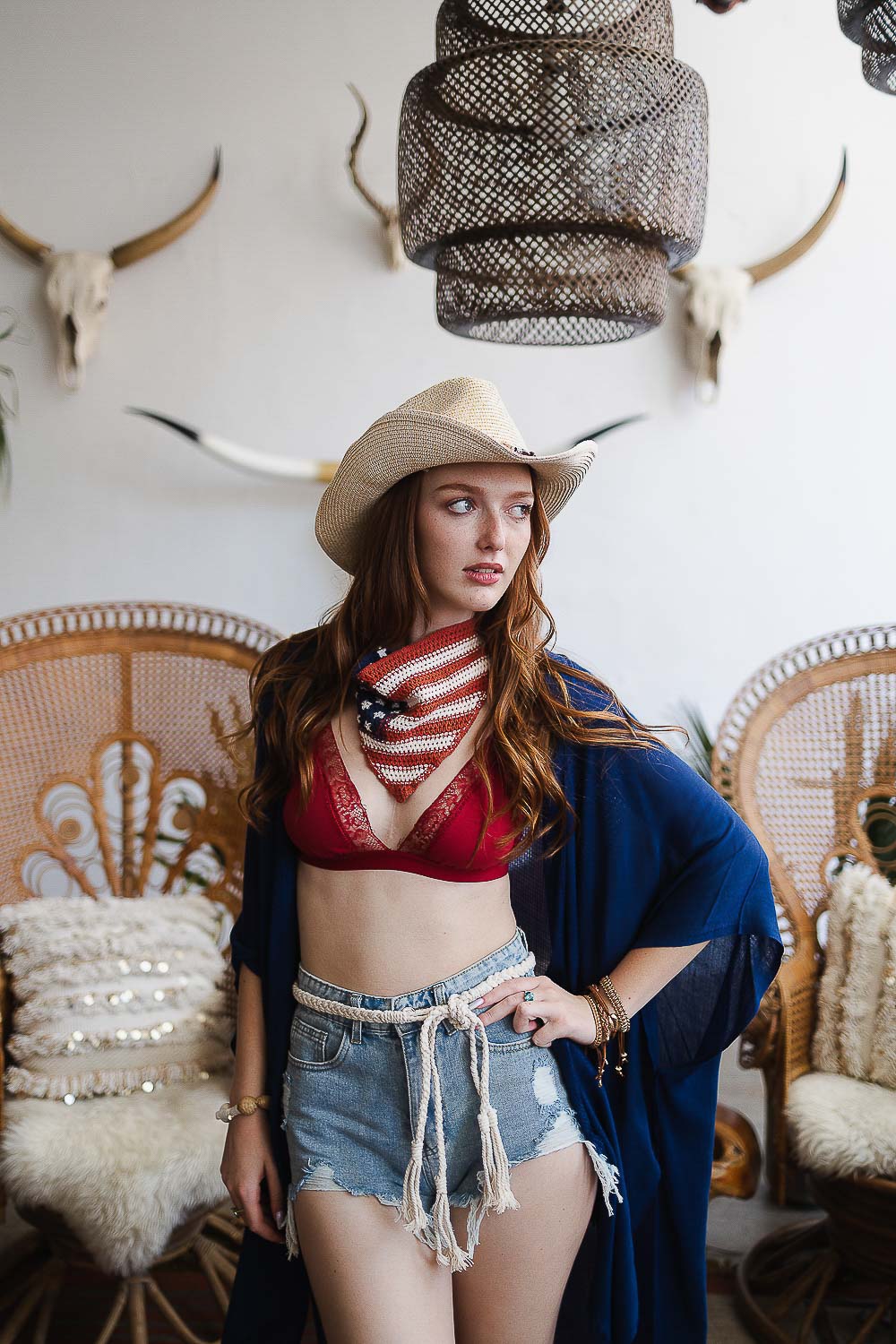 A stylish Boho Outback Hat featuring a whimsical bead chain detail, wide brim for sun protection, and lightweight paper construction, perfect for summer outings.