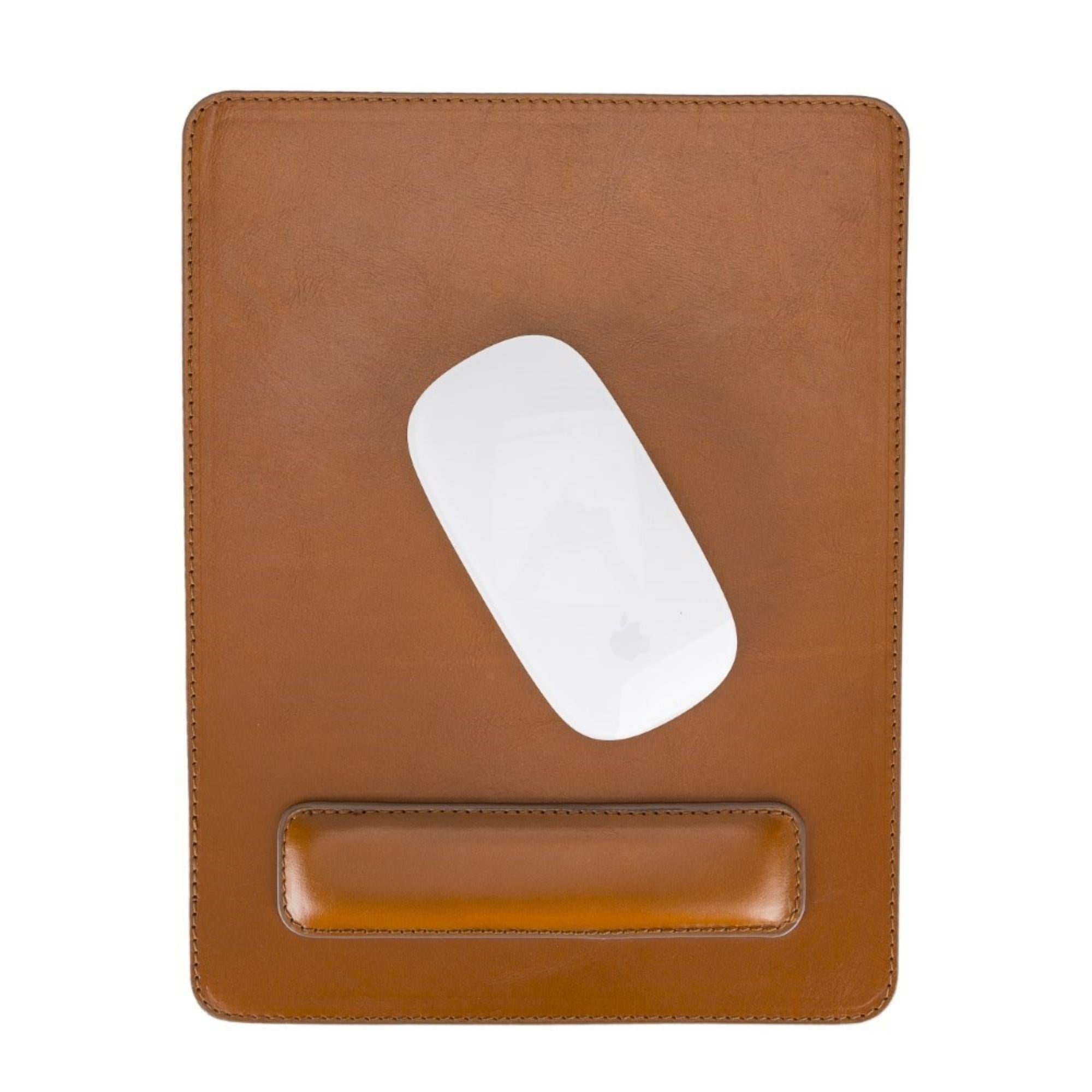 Boulder Full-Grain Leather Mouse Pad with ergonomic hand support, showcasing its luxurious texture and non-slip base.