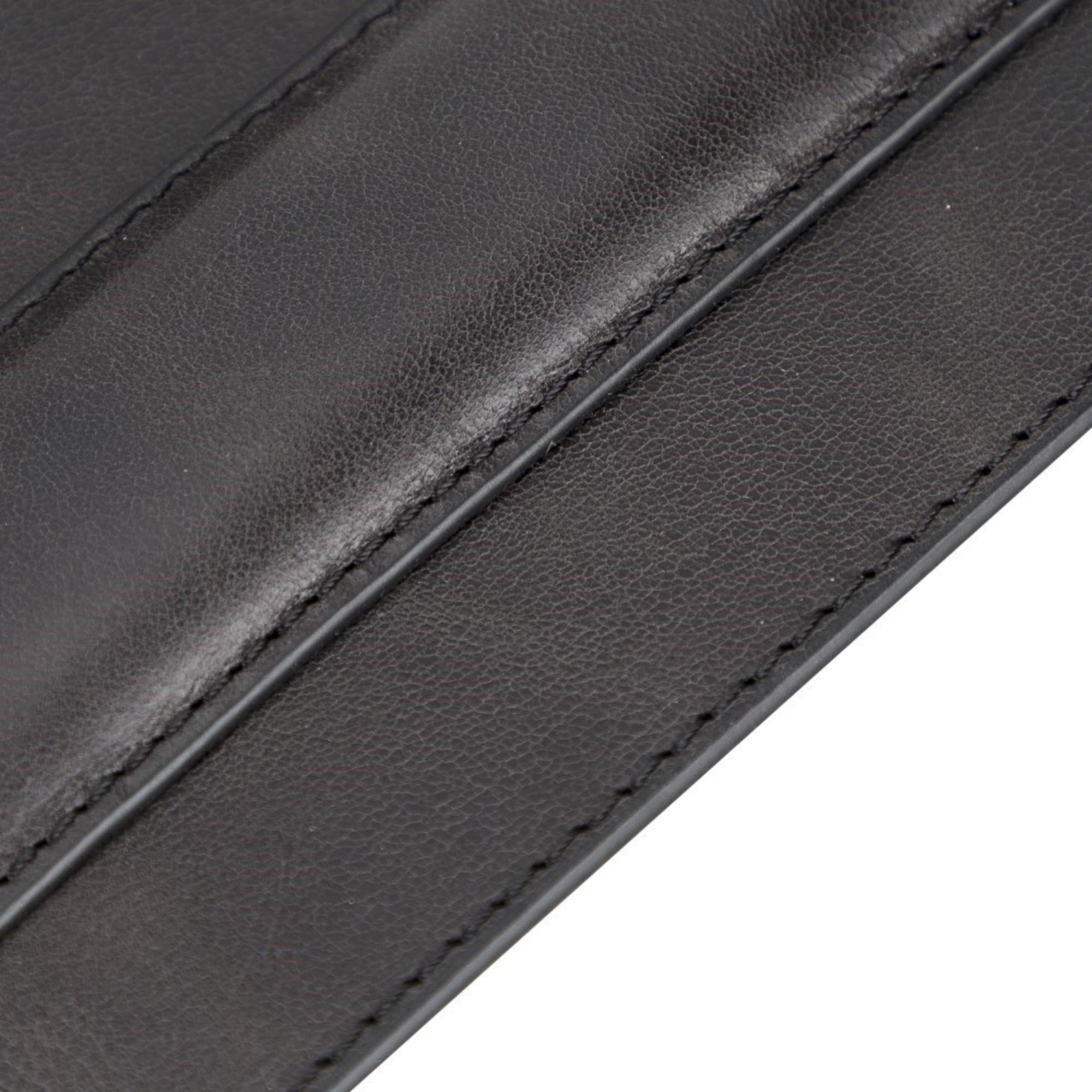 Boulder Full-Grain Leather Mouse Pad with ergonomic hand support, showcasing its luxurious texture and non-slip base.