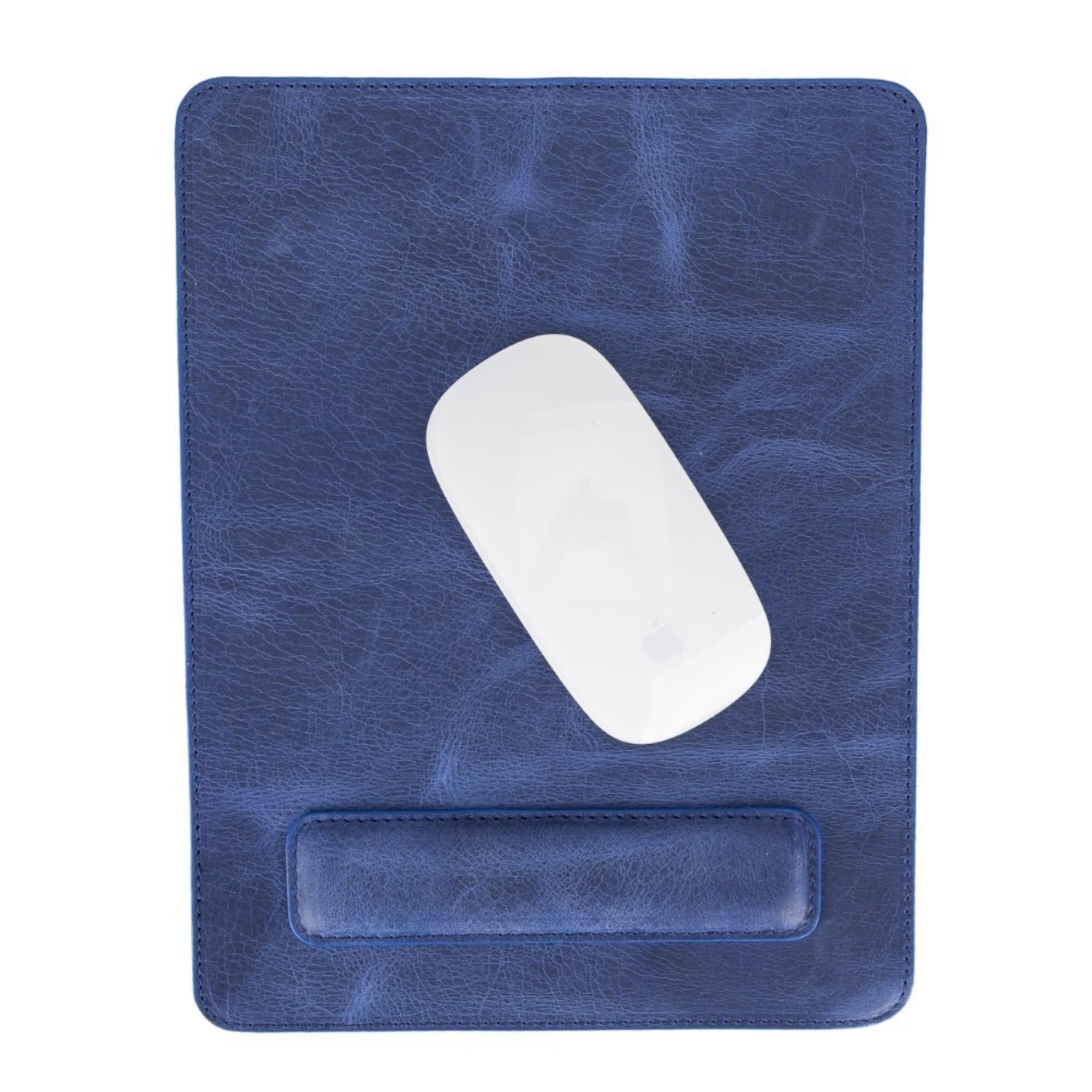 Boulder Full-Grain Leather Mouse Pad with ergonomic hand support, showcasing its luxurious texture and non-slip base.