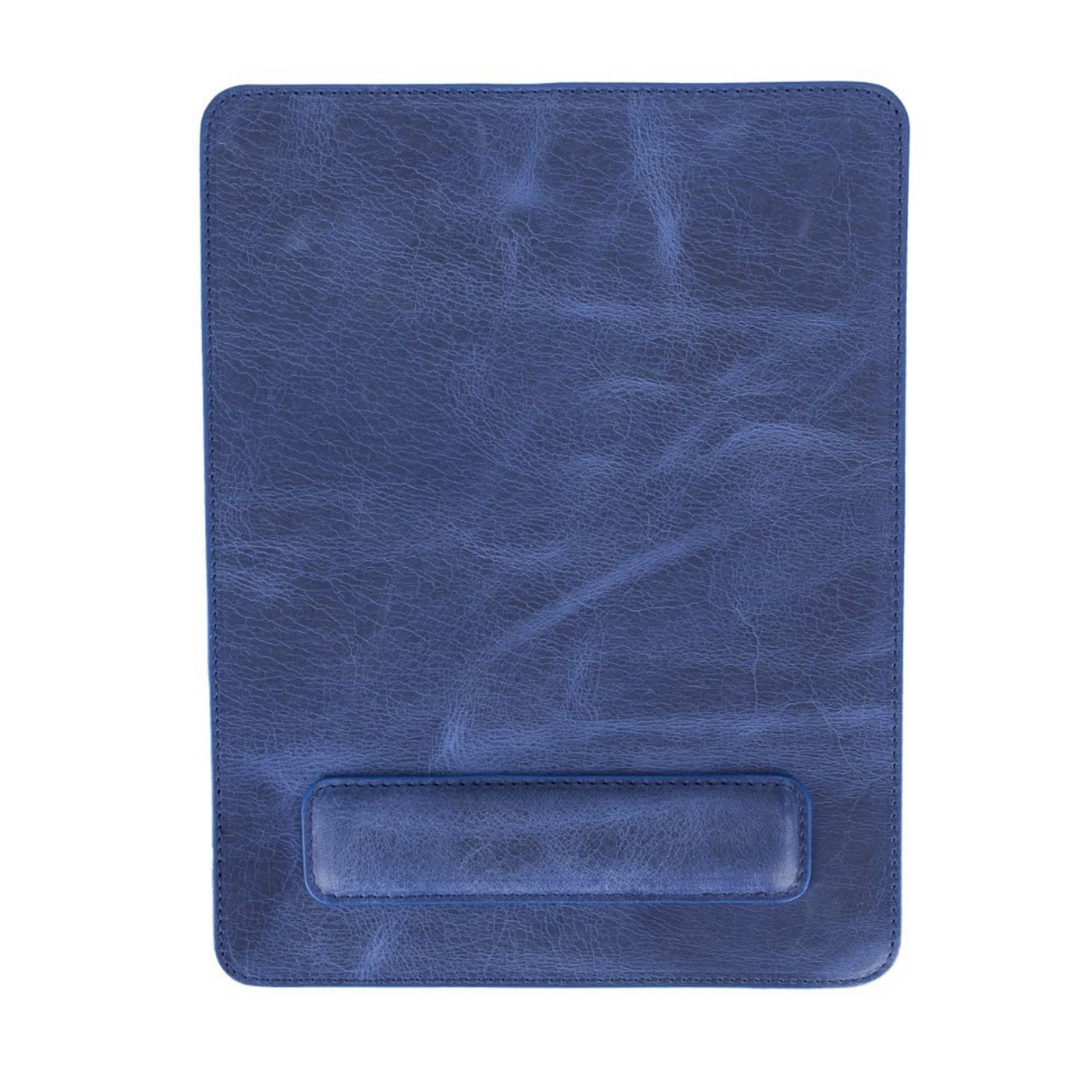 Boulder Full-Grain Leather Mouse Pad with ergonomic hand support, showcasing its luxurious texture and non-slip base.