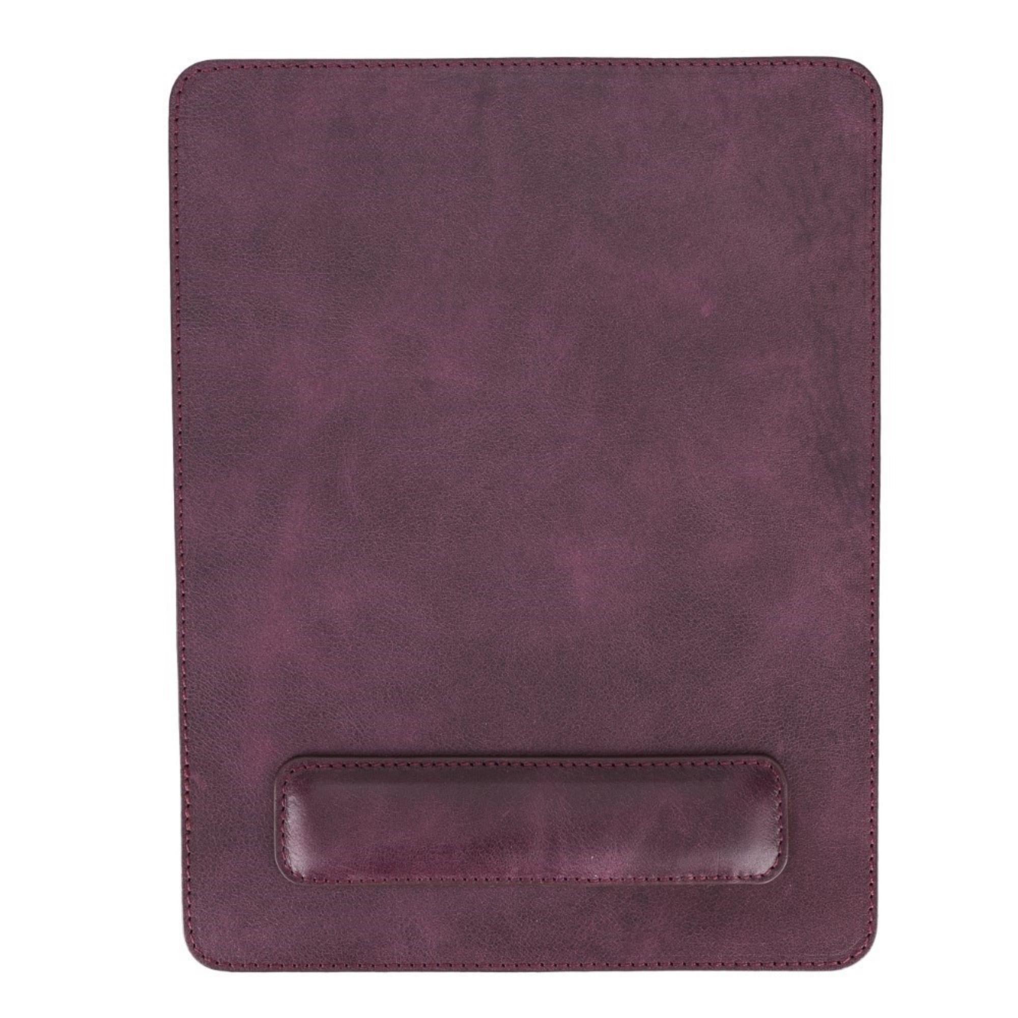 Boulder Full-Grain Leather Mouse Pad with ergonomic hand support, showcasing its luxurious texture and non-slip base.