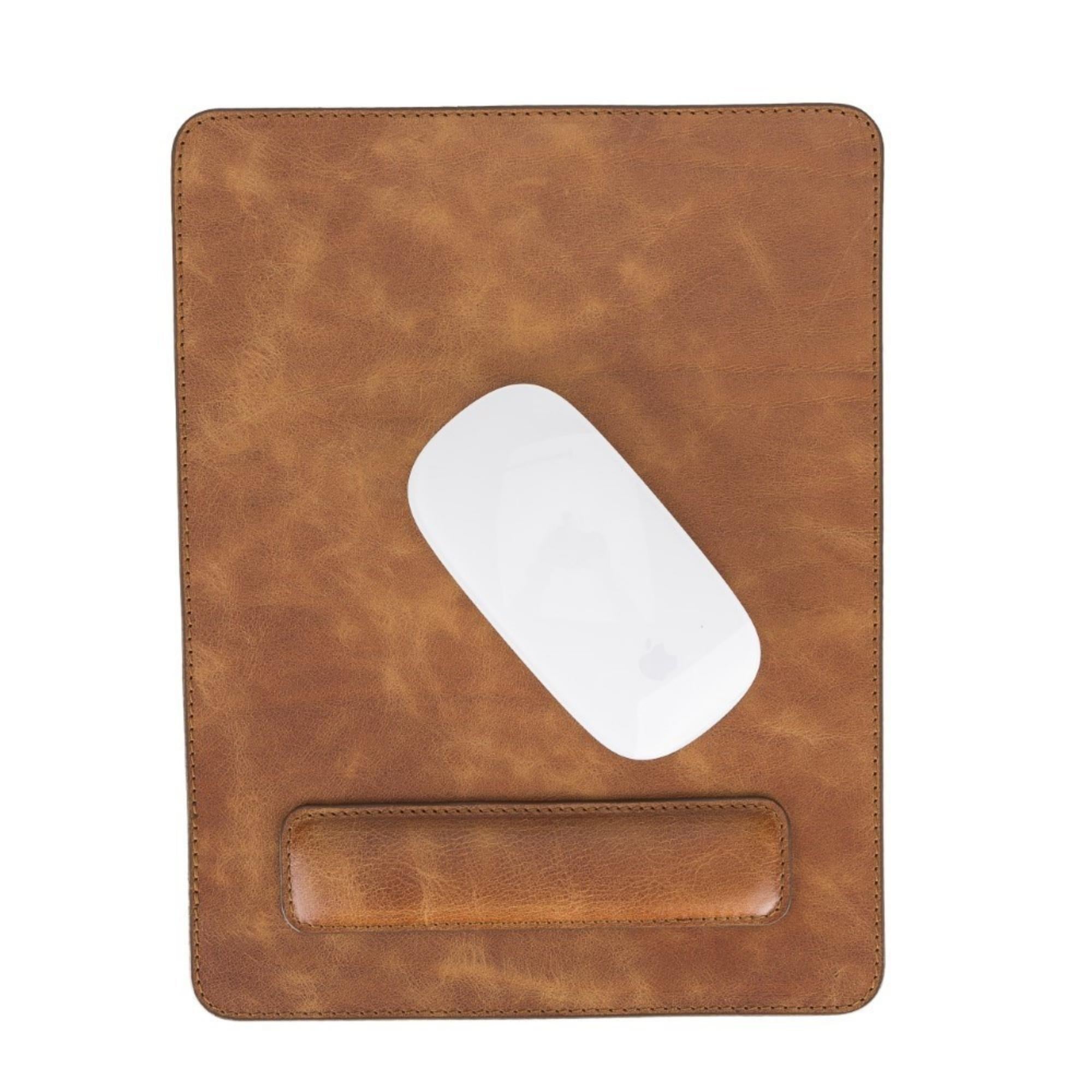 Boulder Full-Grain Leather Mouse Pad with ergonomic hand support, showcasing its luxurious texture and non-slip base.