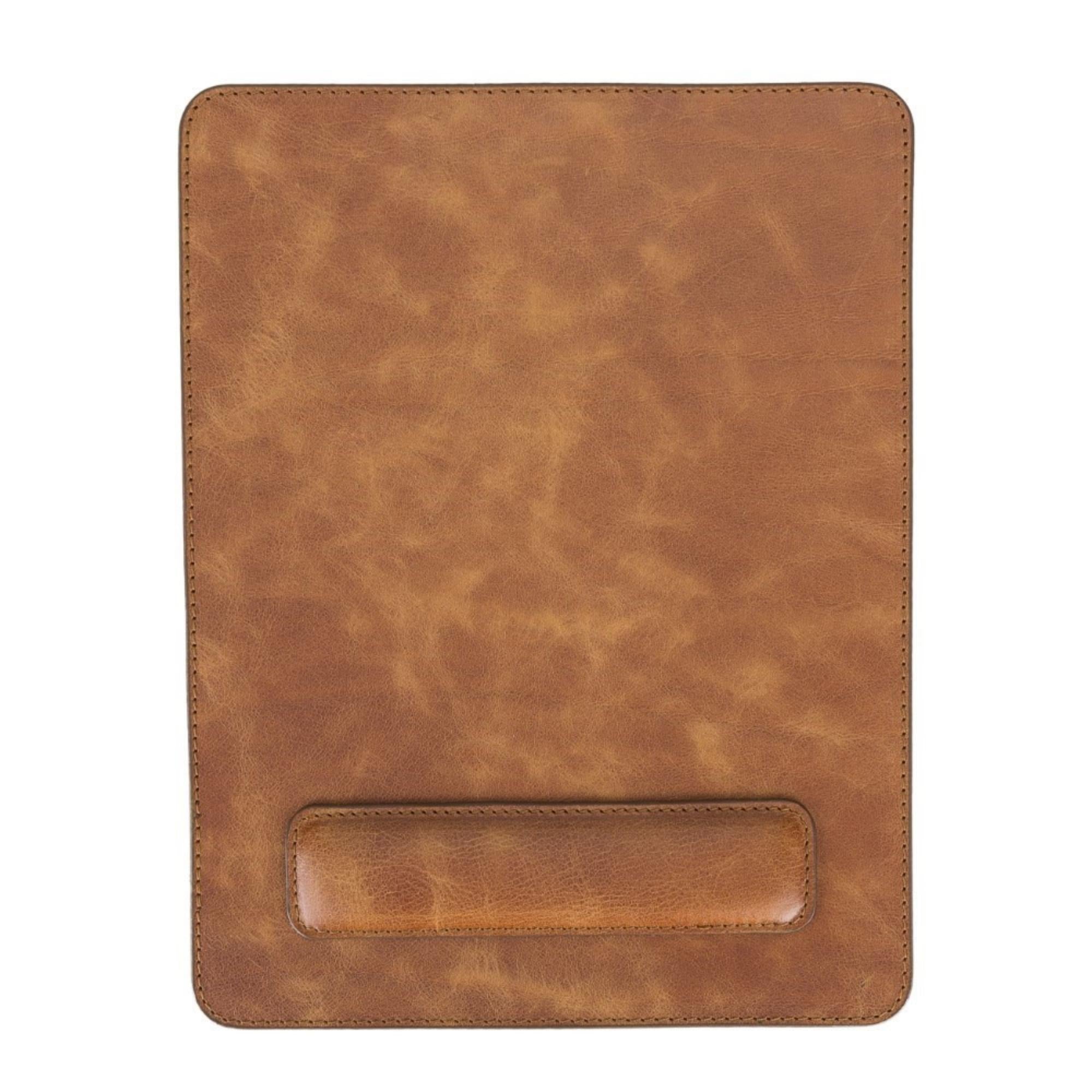 Boulder Full-Grain Leather Mouse Pad with ergonomic hand support, showcasing its luxurious texture and non-slip base.