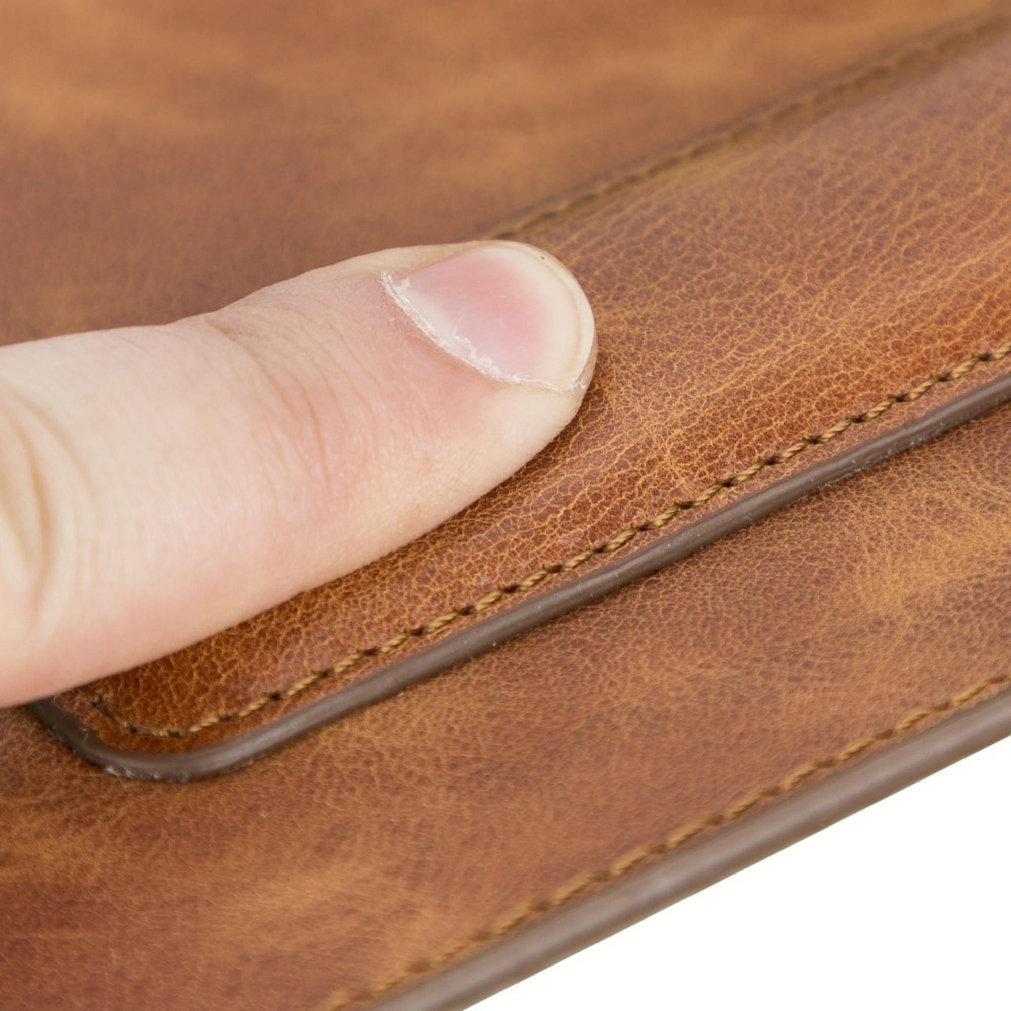 Boulder Full-Grain Leather Mouse Pad with ergonomic hand support, showcasing its luxurious texture and non-slip base.