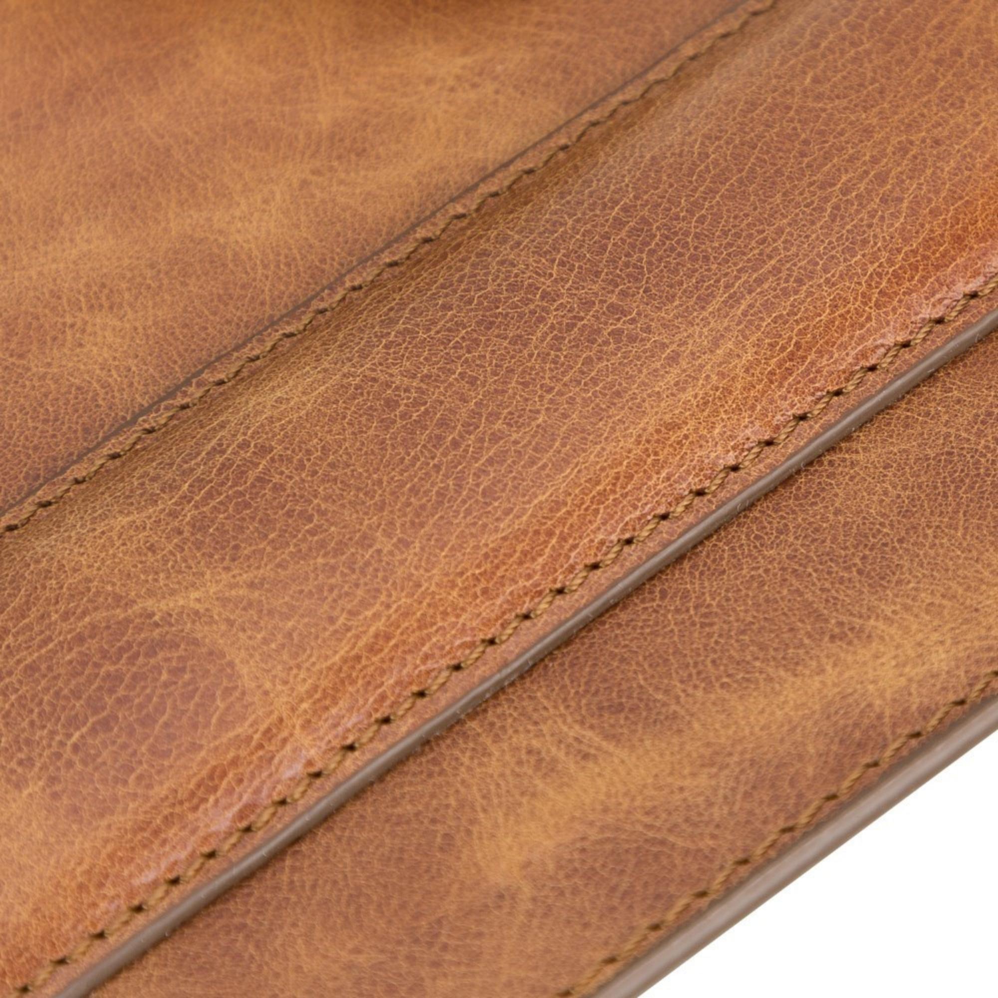 Boulder Full-Grain Leather Mouse Pad with ergonomic hand support, showcasing its luxurious texture and non-slip base.