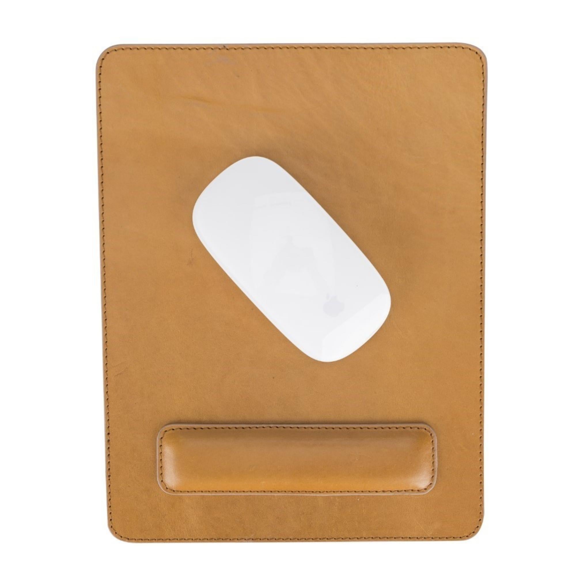 Boulder Full-Grain Leather Mouse Pad with ergonomic hand support, showcasing its luxurious texture and non-slip base.