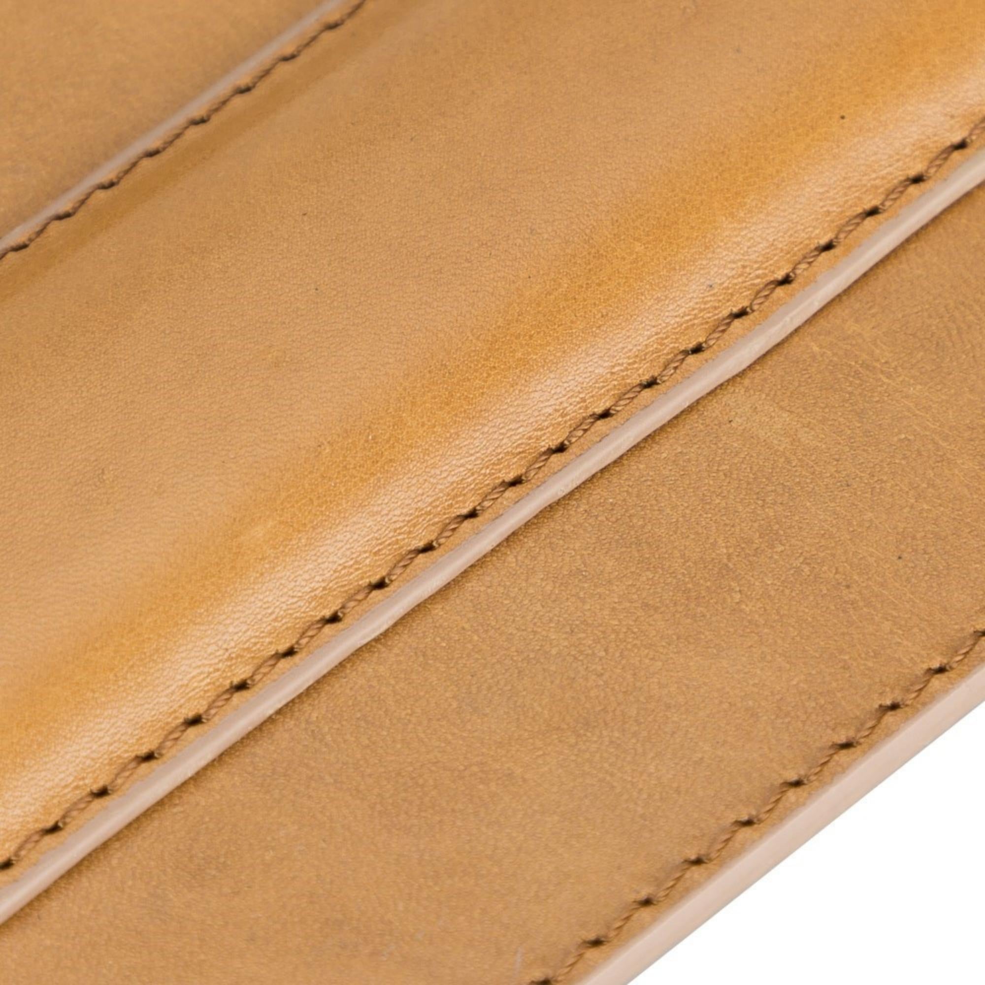 Boulder Full-Grain Leather Mouse Pad with ergonomic hand support, showcasing its luxurious texture and non-slip base.