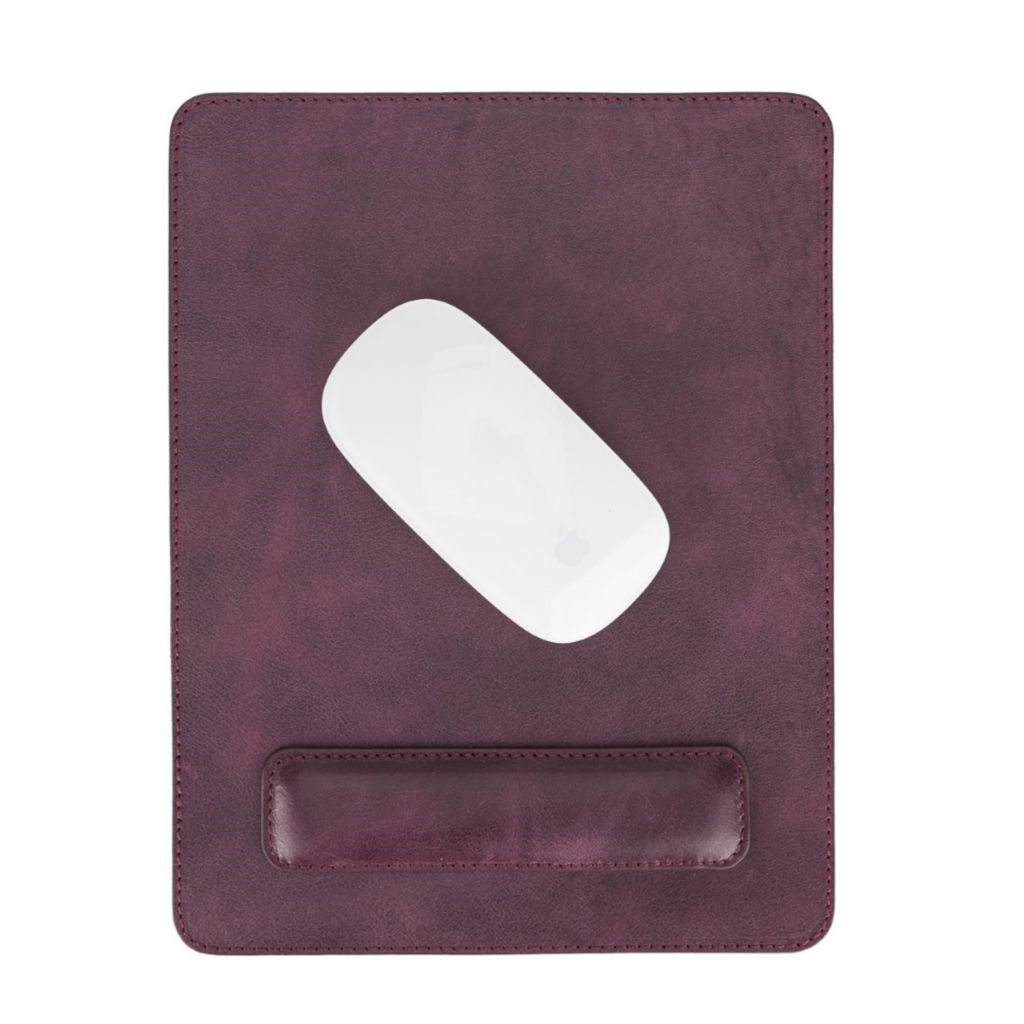 Boulder Full-Grain Leather Mouse Pad with ergonomic hand support, showcasing its luxurious texture and non-slip base.