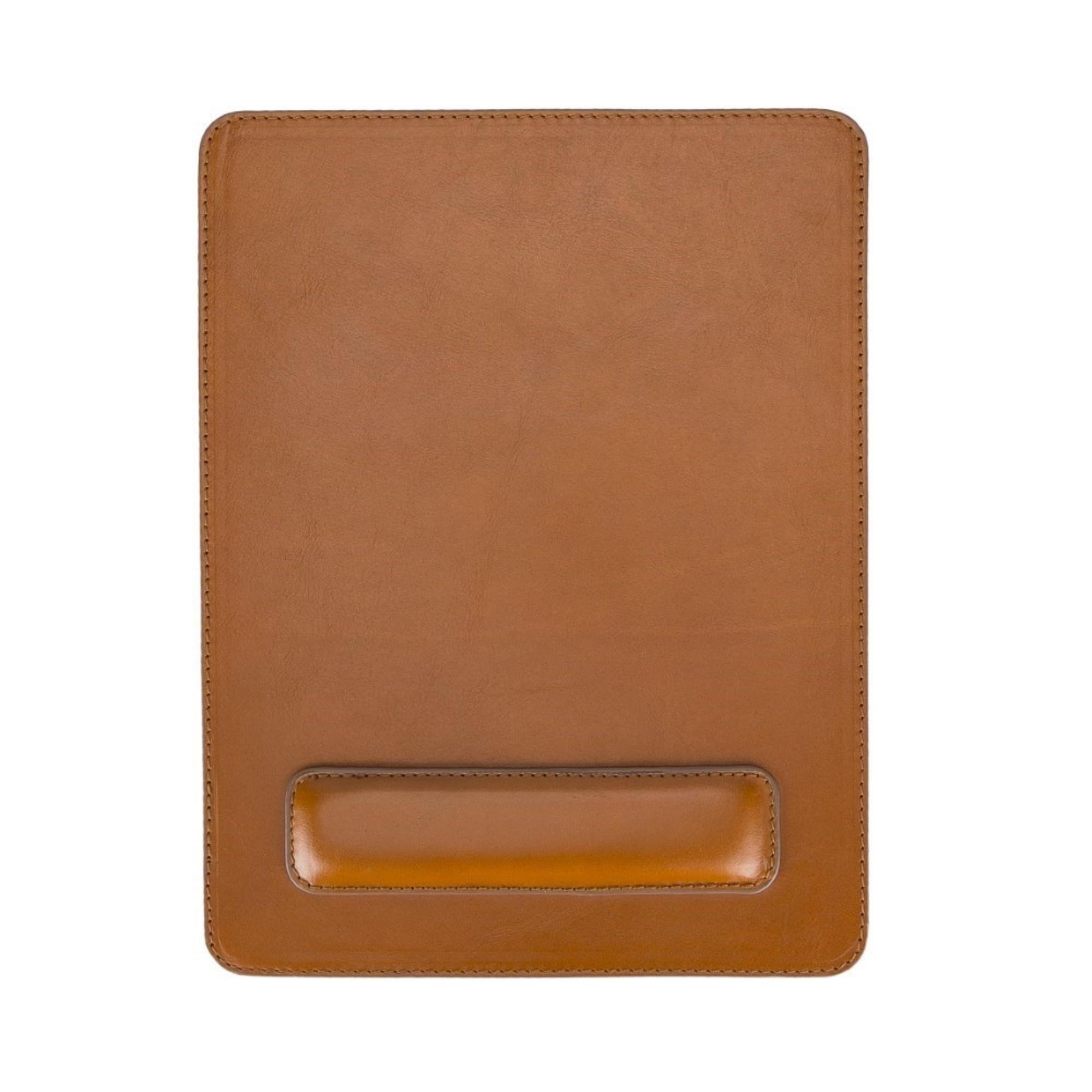 Boulder Full-Grain Leather Mouse Pad with ergonomic hand support, showcasing its luxurious texture and non-slip base.