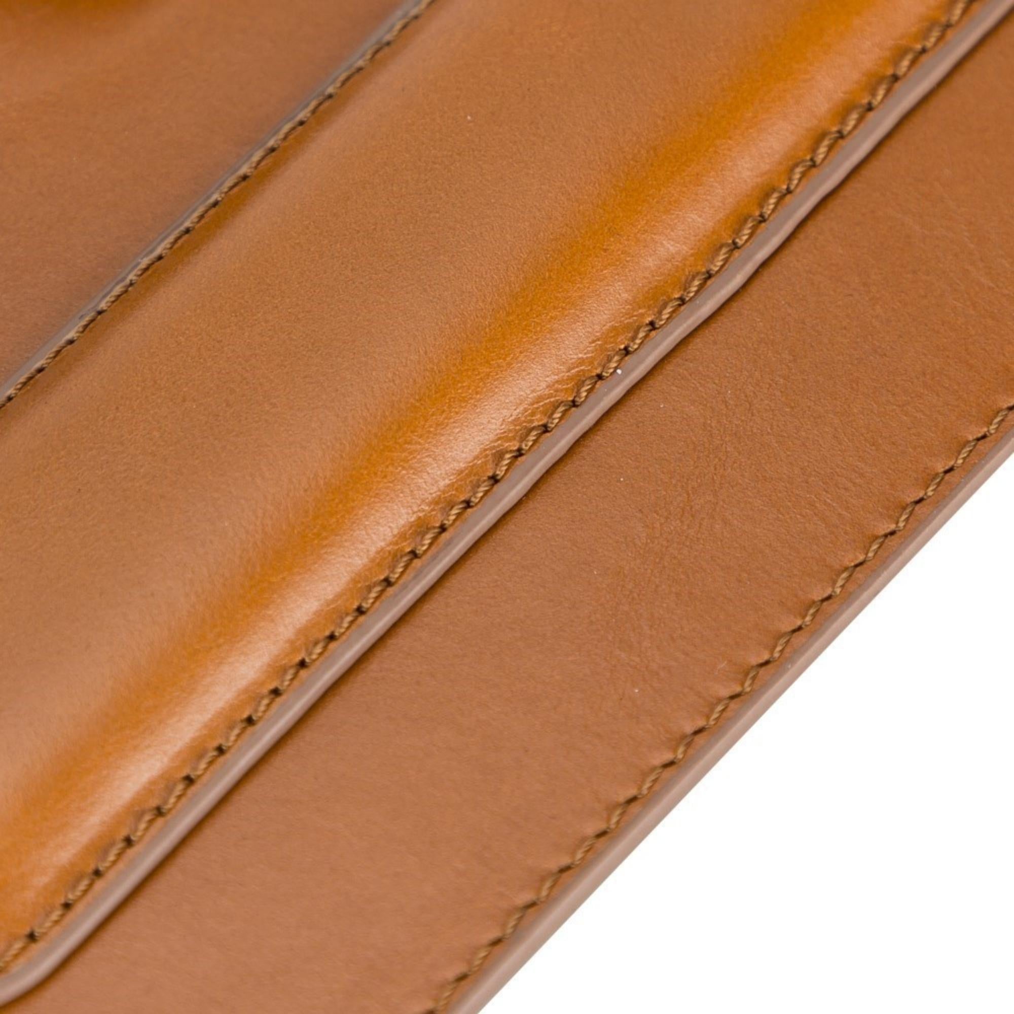 Boulder Full-Grain Leather Mouse Pad with ergonomic hand support, showcasing its luxurious texture and non-slip base.