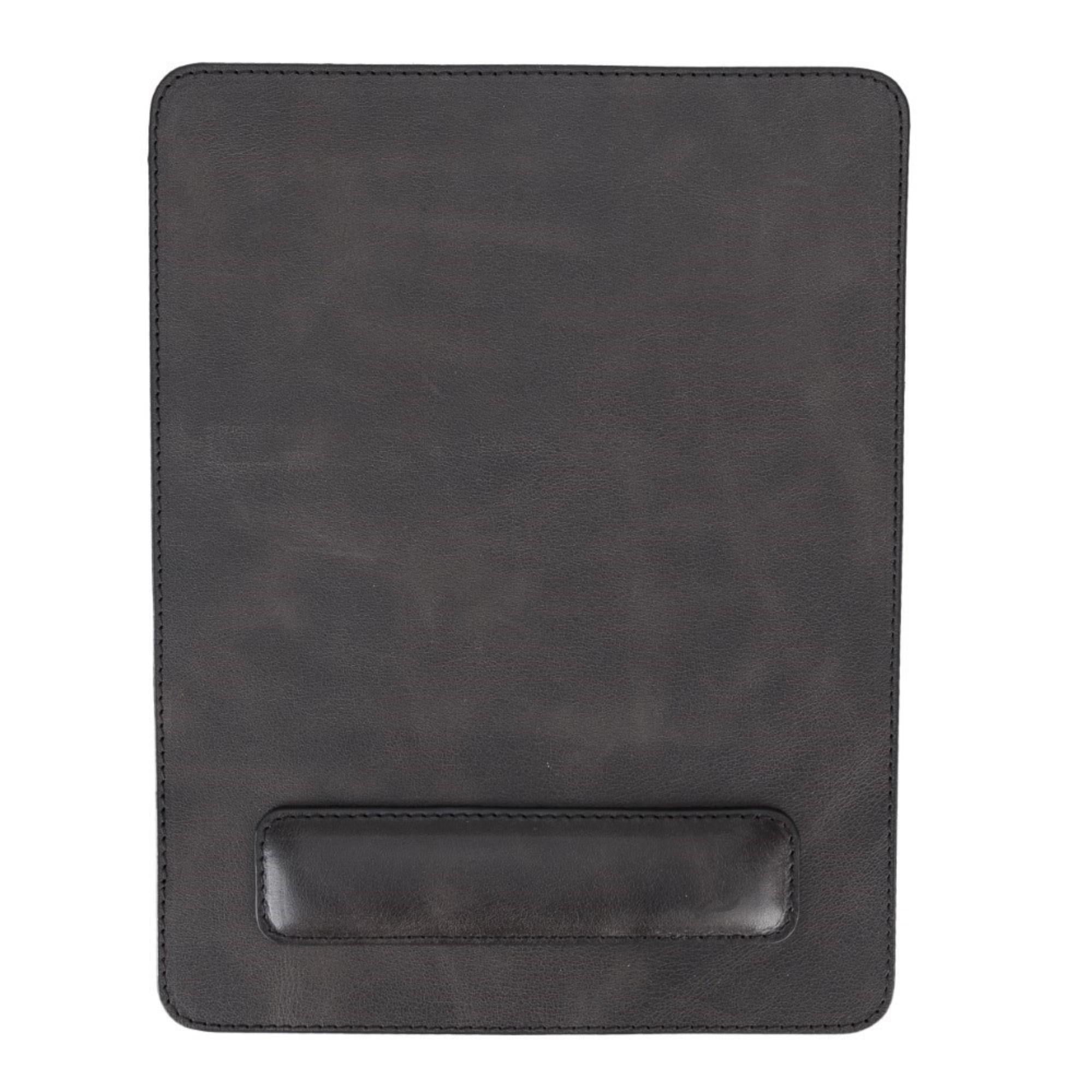 Boulder Full-Grain Leather Mouse Pad with ergonomic hand support, showcasing its luxurious texture and non-slip base.