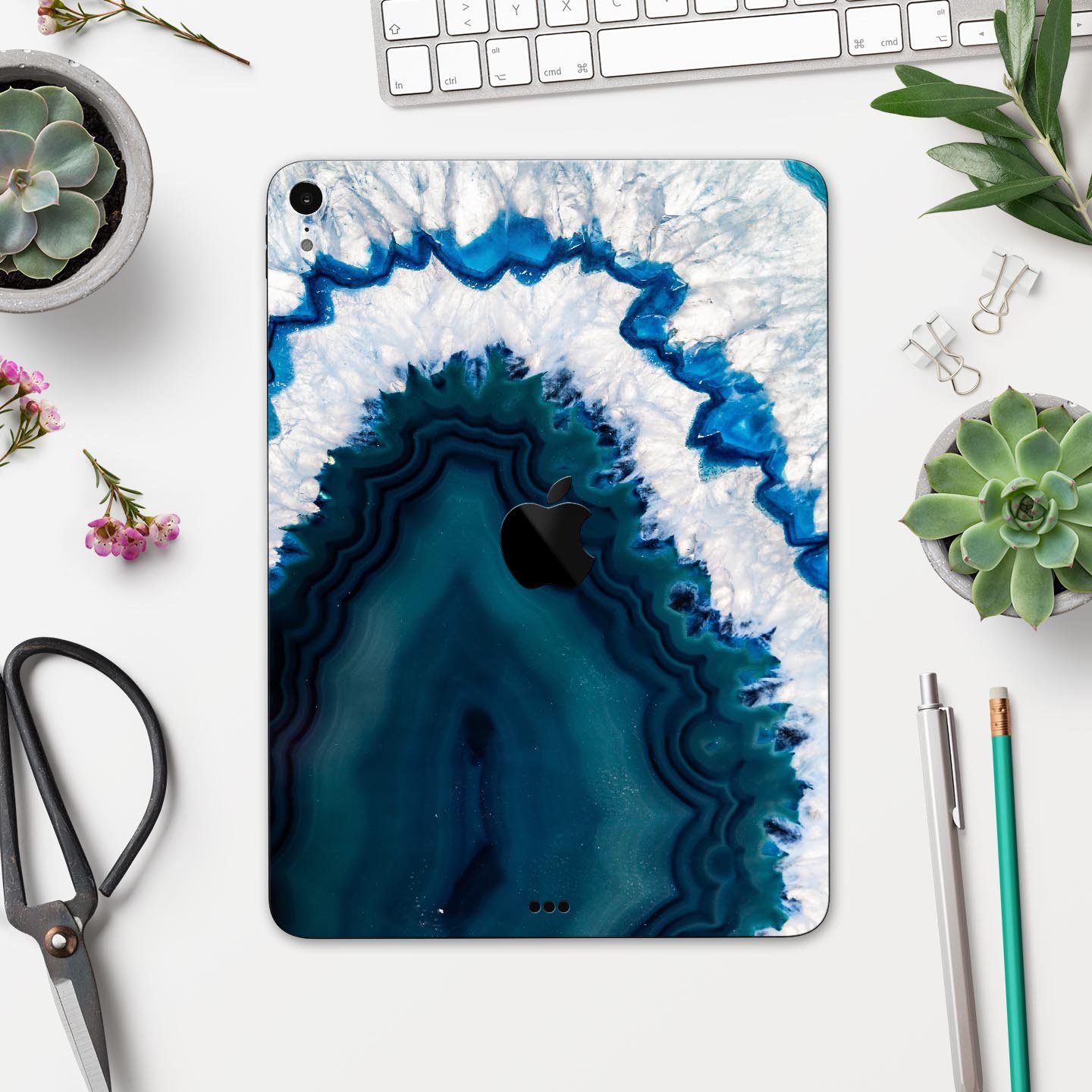 Bright Blue Agate Slice skin decal for Apple iPad Pro, showcasing vibrant blue and natural stone patterns.