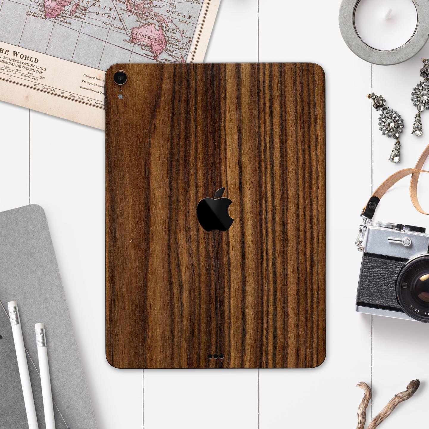 Bright Ebony Woodgrain skin decal for Apple iPad Pro, showcasing a sleek wood texture design for stylish protection.