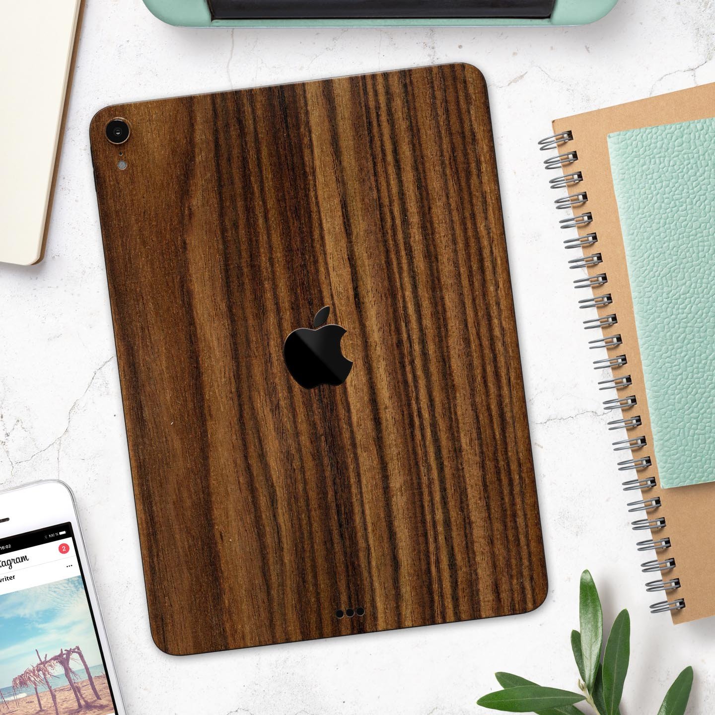 Bright Ebony Woodgrain skin decal for Apple iPad Pro, showcasing a sleek wood texture design for stylish protection.