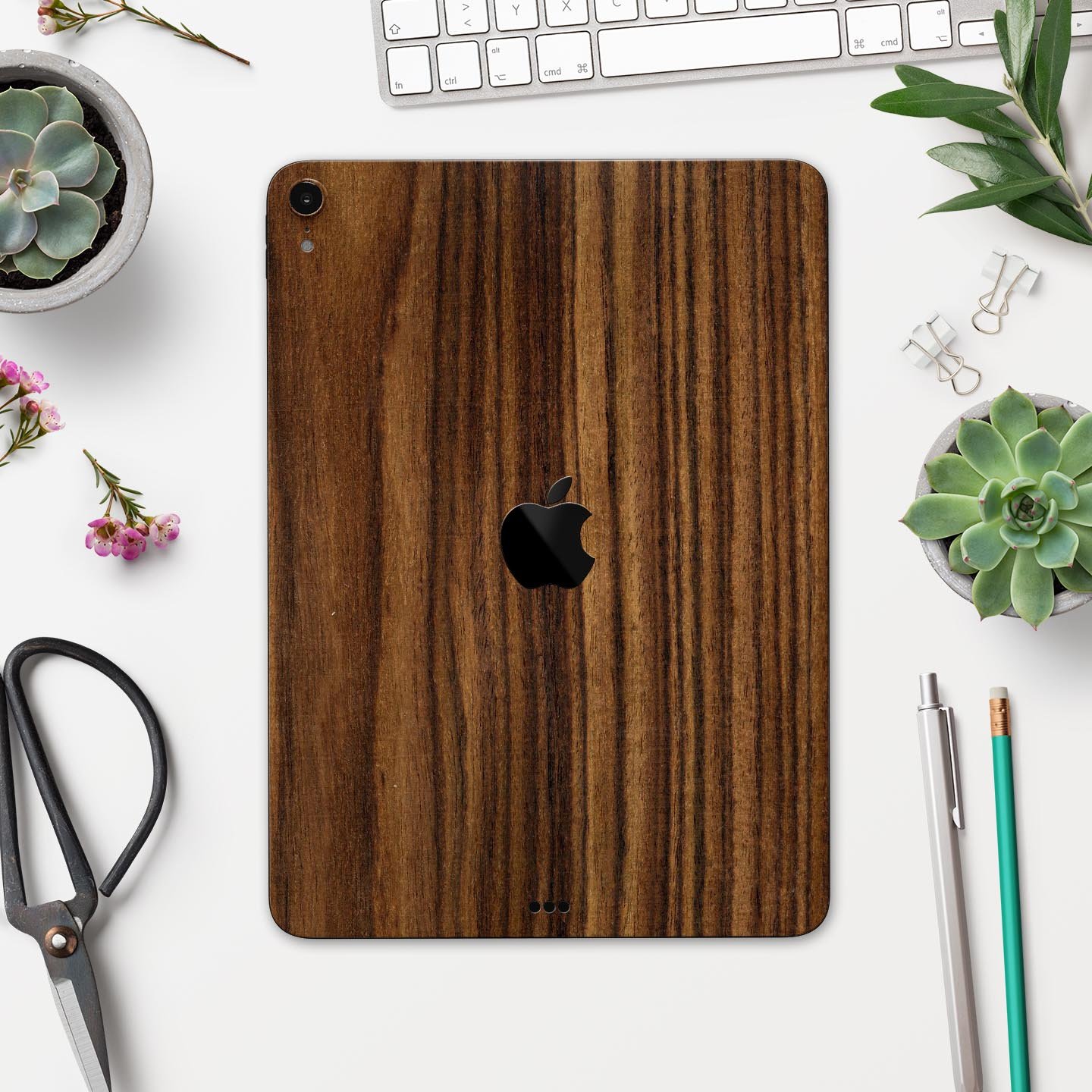 Bright Ebony Woodgrain skin decal for Apple iPad Pro, showcasing a sleek wood texture design for stylish protection.