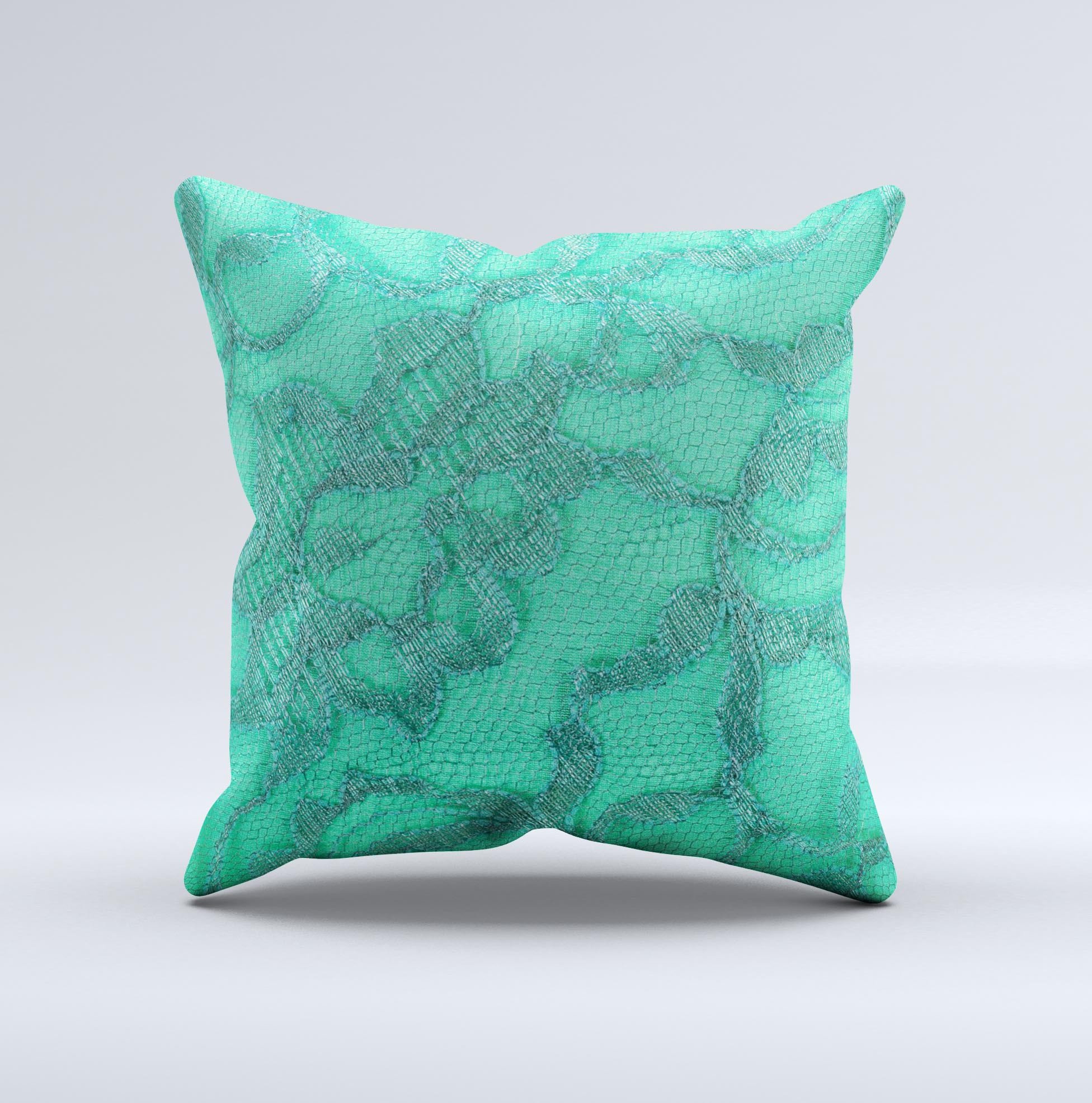 Bright green decorative throw pillow with lace design, showcasing unique handmade details and high-quality fabric.