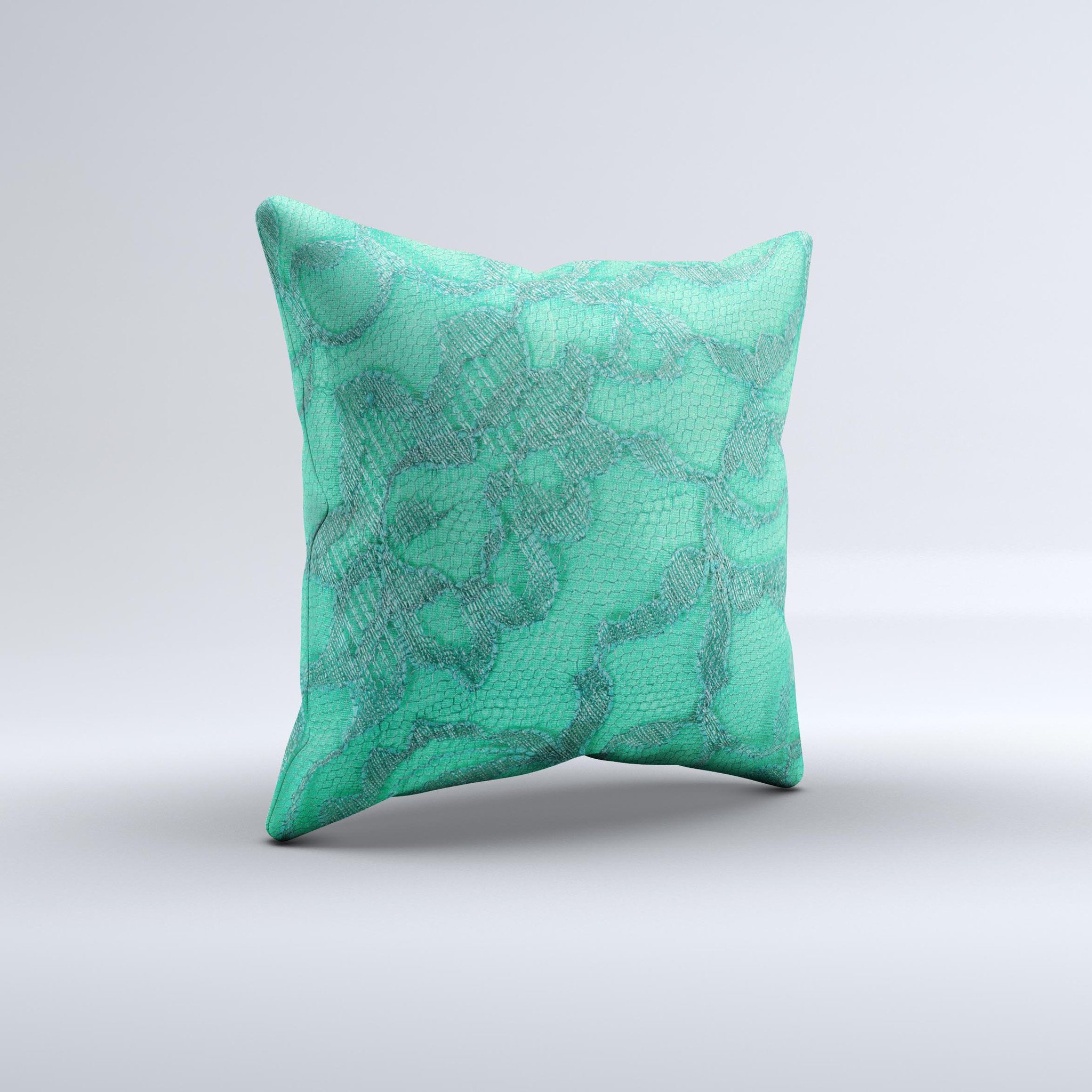 Bright green decorative throw pillow with lace design, showcasing unique handmade details and high-quality fabric.