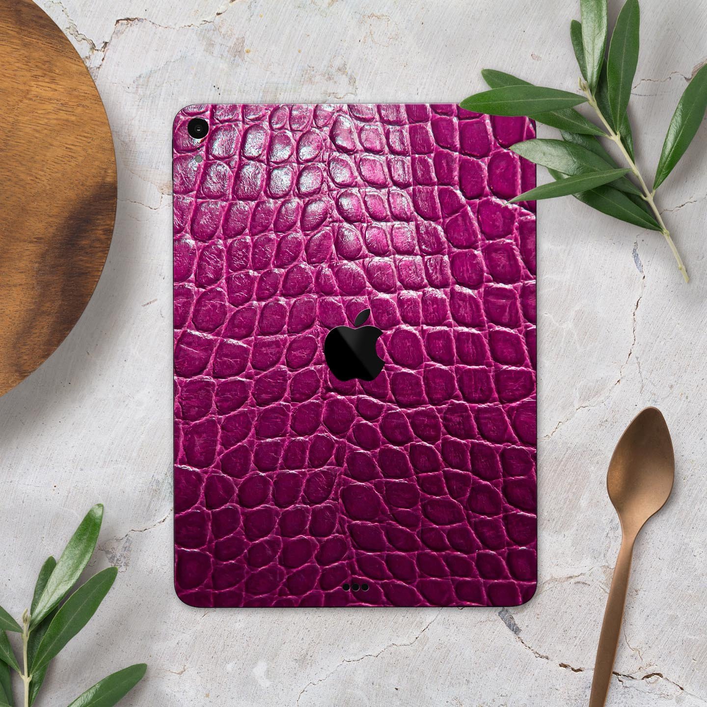 Bright magenta alligator skin decal for Apple devices, showcasing a textured design and vibrant color for stylish protection.