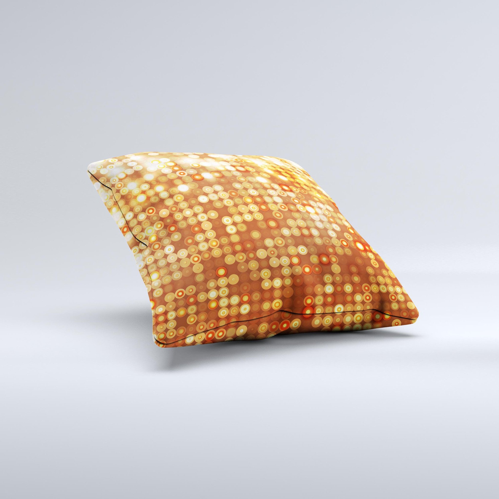 Bright orange decorative throw pillow with unfocused circle patterns, showcasing a unique handmade design.