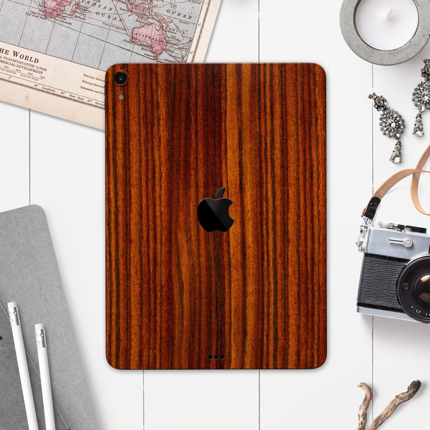 Bright Red Ebony Woodgrain skin decal for Apple iPad, showcasing its vibrant woodgrain design and ultra-thin profile.