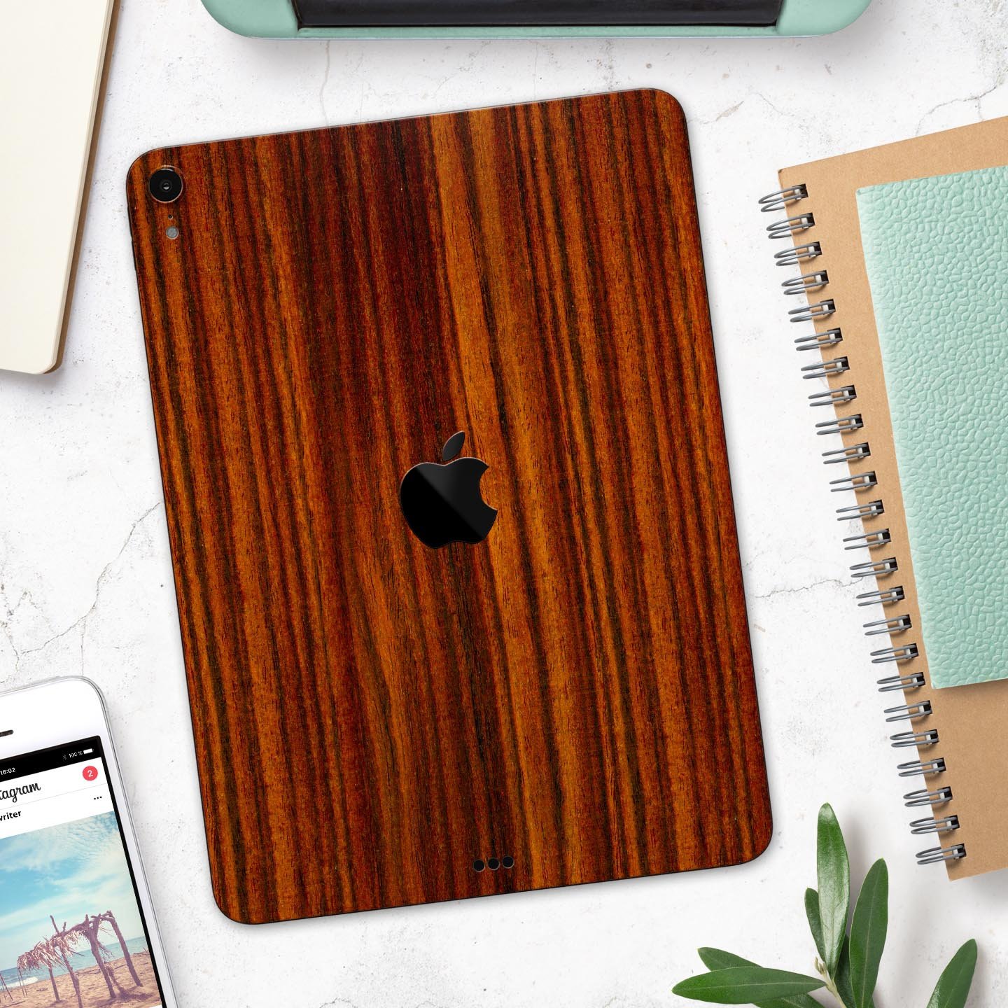 Bright Red Ebony Woodgrain skin decal for Apple iPad, showcasing its vibrant woodgrain design and ultra-thin profile.