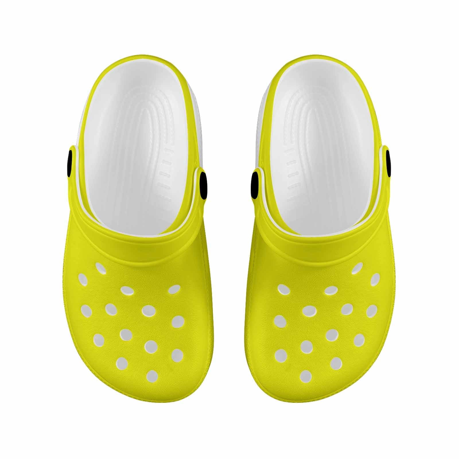 Bright yellow clogs designed for youth, featuring a slip-on style and ventilation ports for breathability.