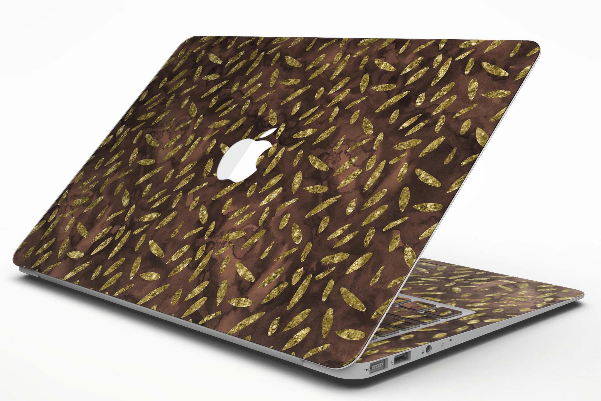 Brown and gold leaf patterned skin for MacBook Air, showcasing a stylish design that protects the device from scratches.