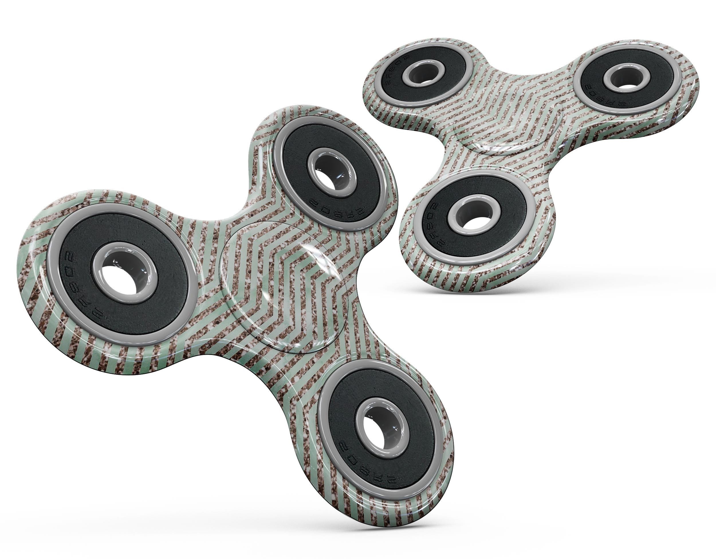 Brown and green glimmer chevron fidget spinner skin kit, showcasing a stylish design for personalization and protection.