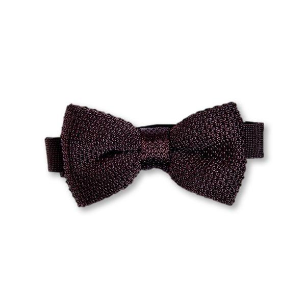 A stylish brown knitted bow tie displayed on a white background, showcasing its texture and dimensions.