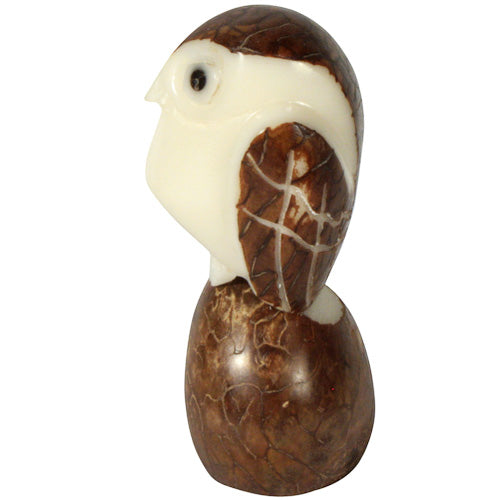 A beautifully hand-carved Brown Owl figurine made from tagua nuts, showcasing intricate details and natural colors, symbolizing eco-friendliness.