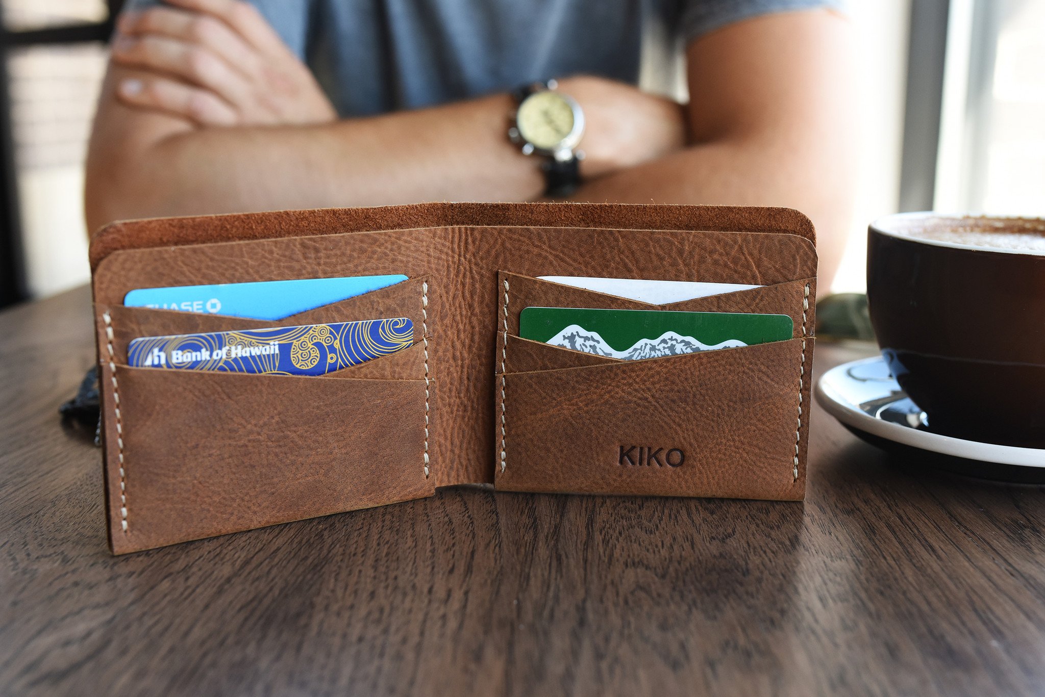 Buck Bifold wallet made of premium cowhide leather with six card slots and a smooth finish.