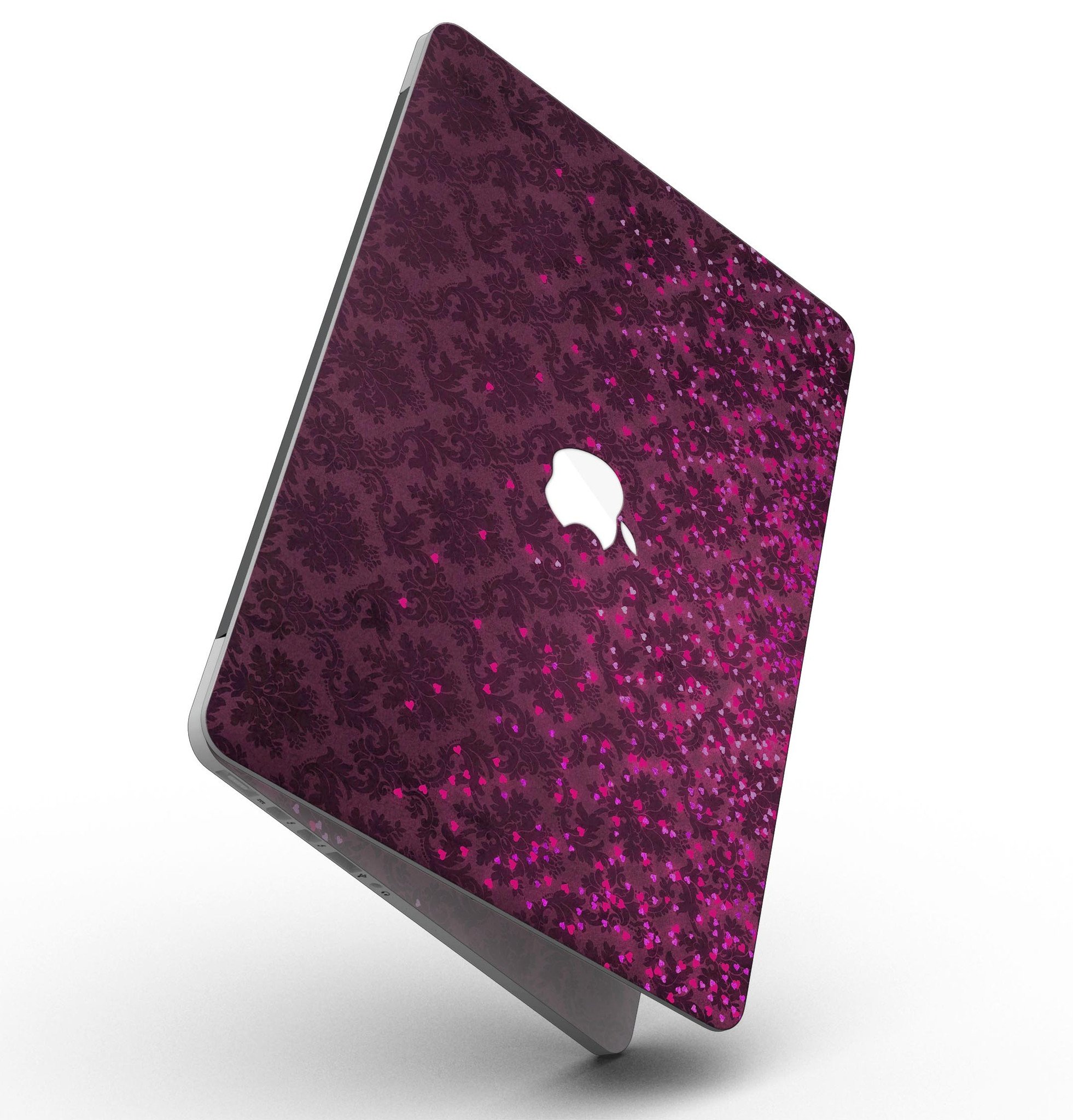 Burgundy Falling Micro Hearts skin for MacBook Pro with Retina Display, showcasing a stylish design that protects the device.