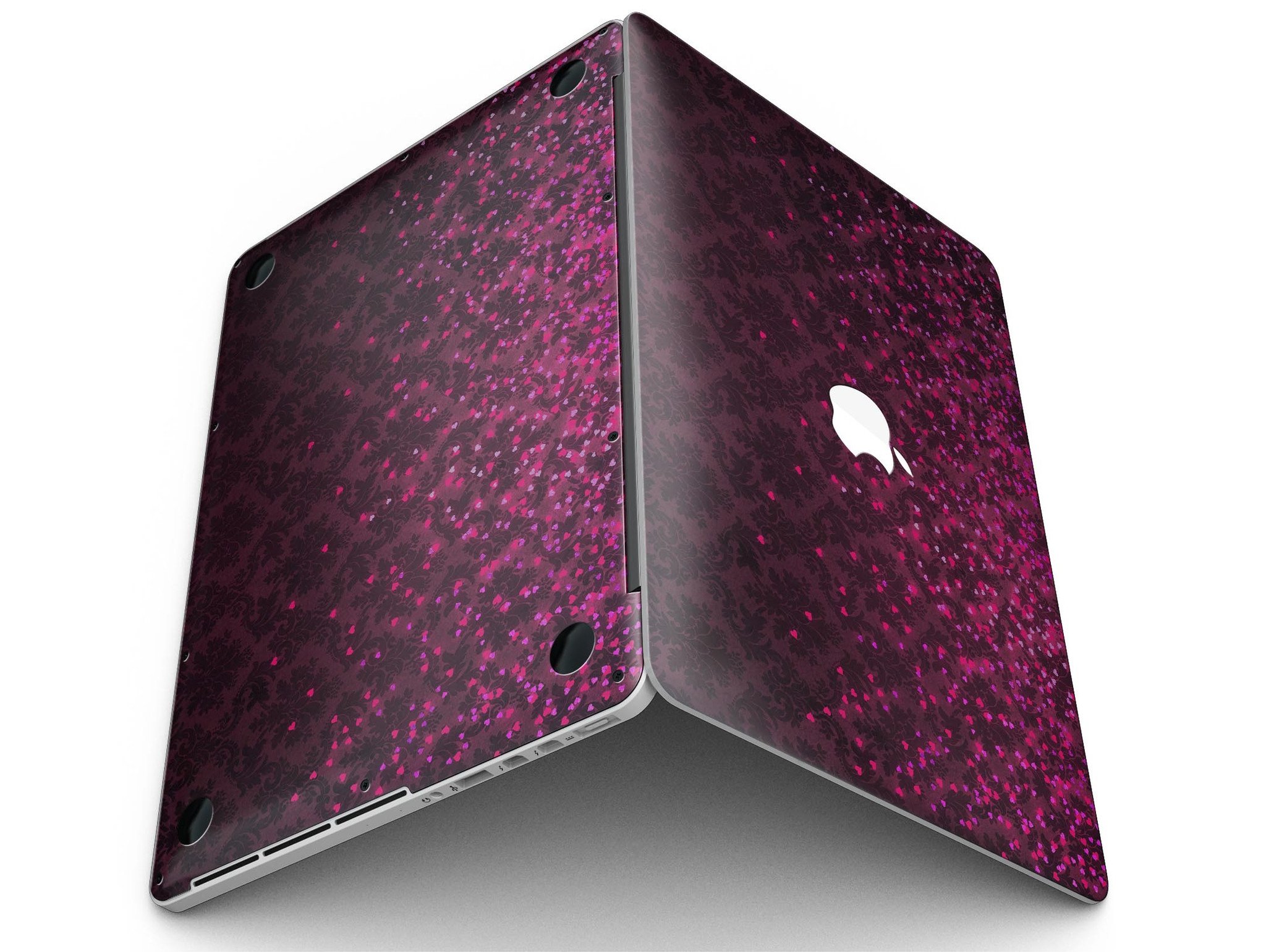 Burgundy Falling Micro Hearts skin for MacBook Pro with Retina Display, showcasing a stylish design that protects the device.