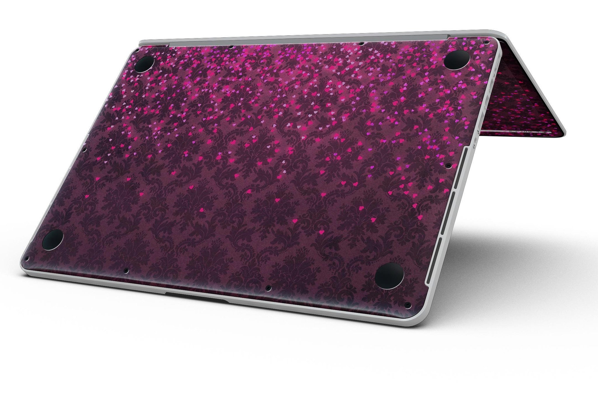 Burgundy Falling Micro Hearts skin for MacBook Pro with Retina Display, showcasing a stylish design that protects the device.