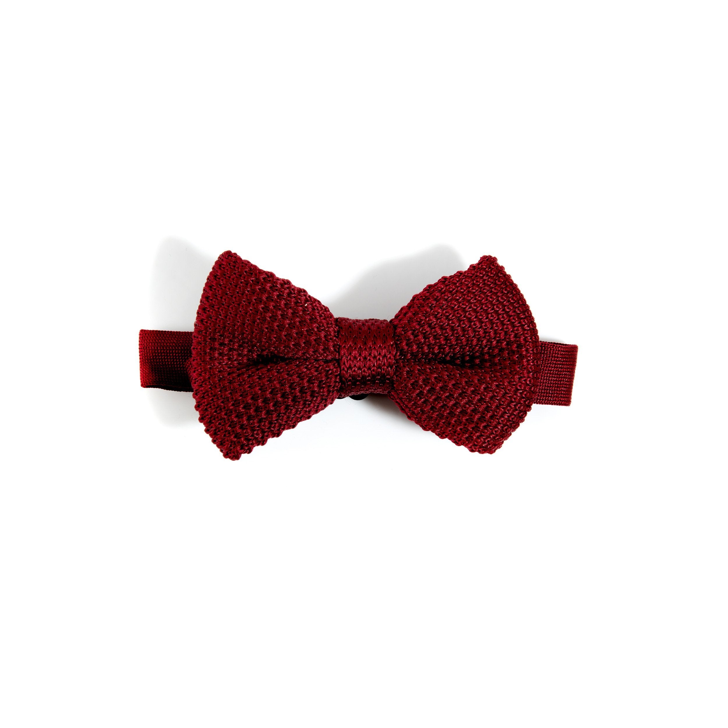 Burgundy children's knitted bow tie with adjustable strap, perfect for ages 2-11, stylish and elegant accessory.