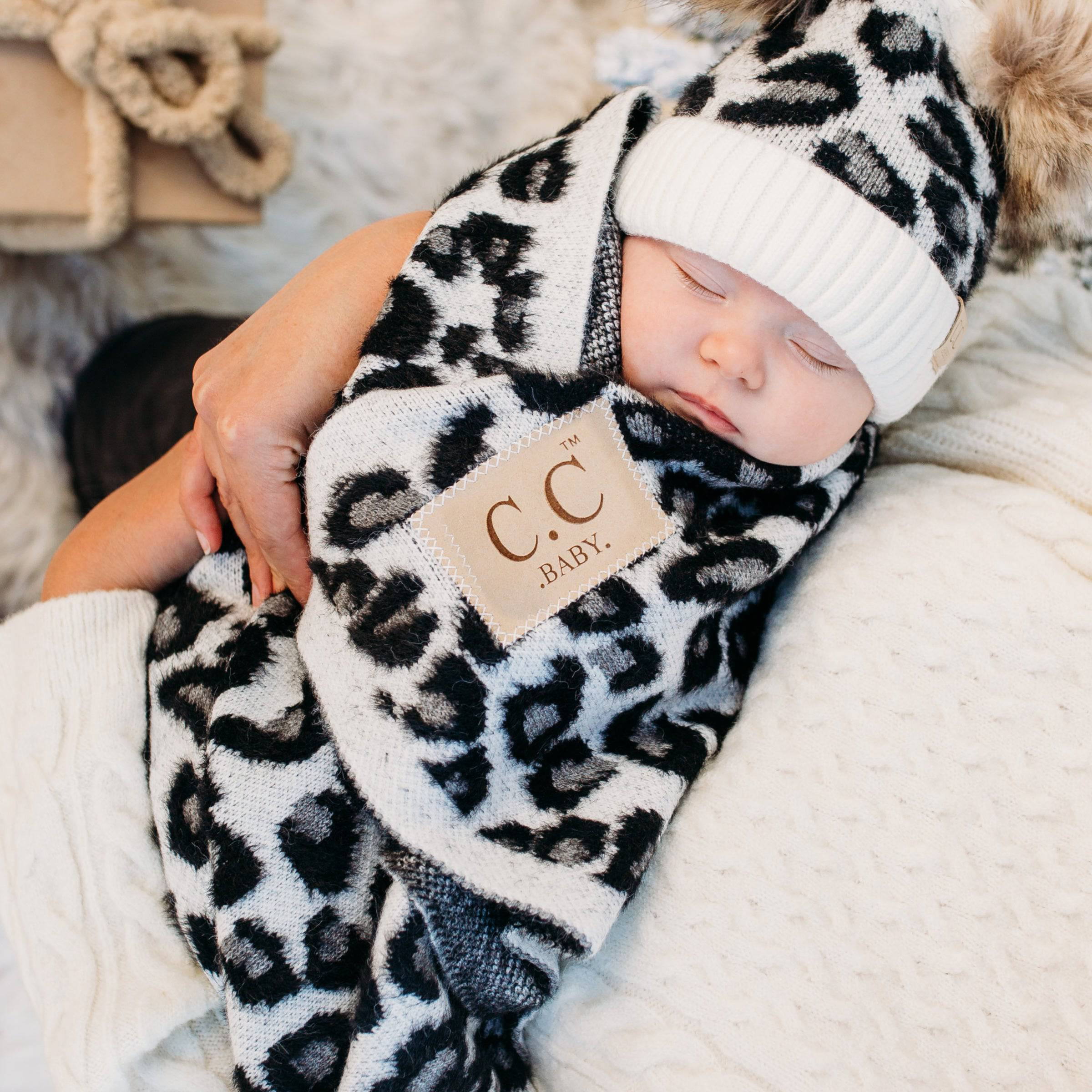 CC Baby Leopard Blanket featuring a trendy leopard print design, perfect for infants and toddlers, made from ultra-soft materials.