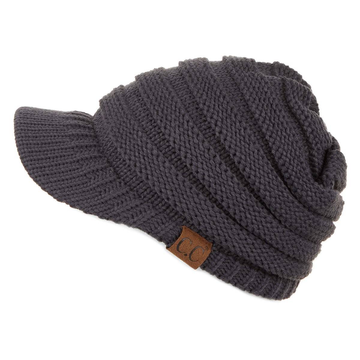 CC Beanie Brim Cap featuring a stylish brim and cable knit design, perfect for winter wear.