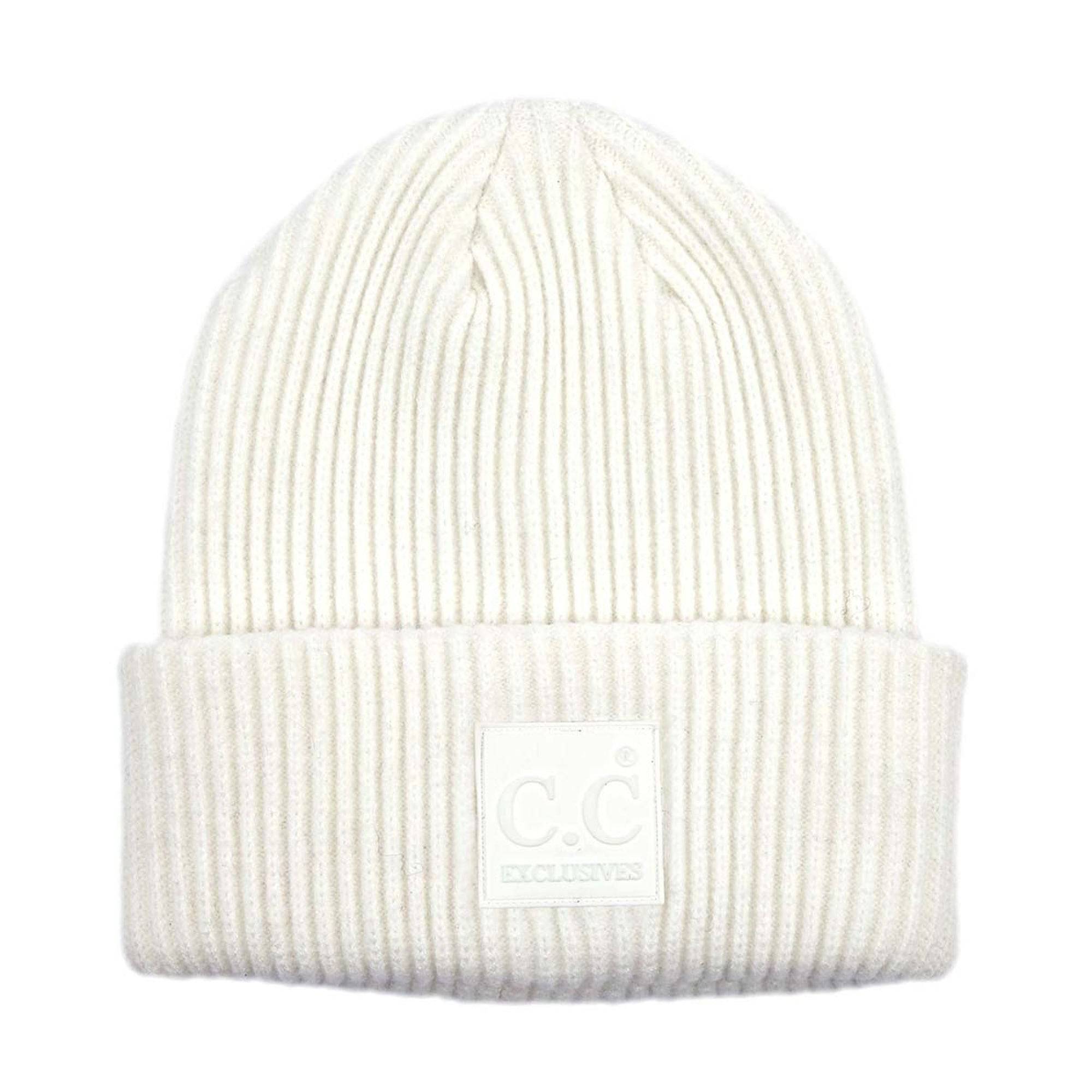 CC Beanie Cap featuring a solid ribbed knit design and a CC® Rubber Patch, perfect for teens and adults.