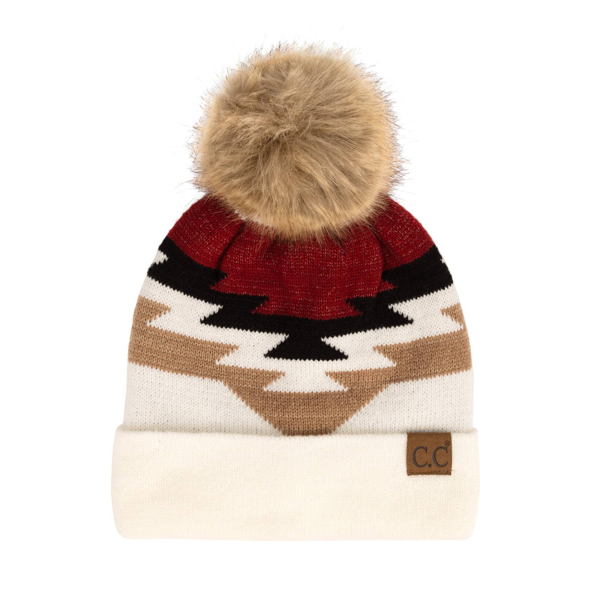 CC Beanie with Pom featuring a South Western Aztec pattern, showcasing its soft faux fur pom pom and vibrant design.