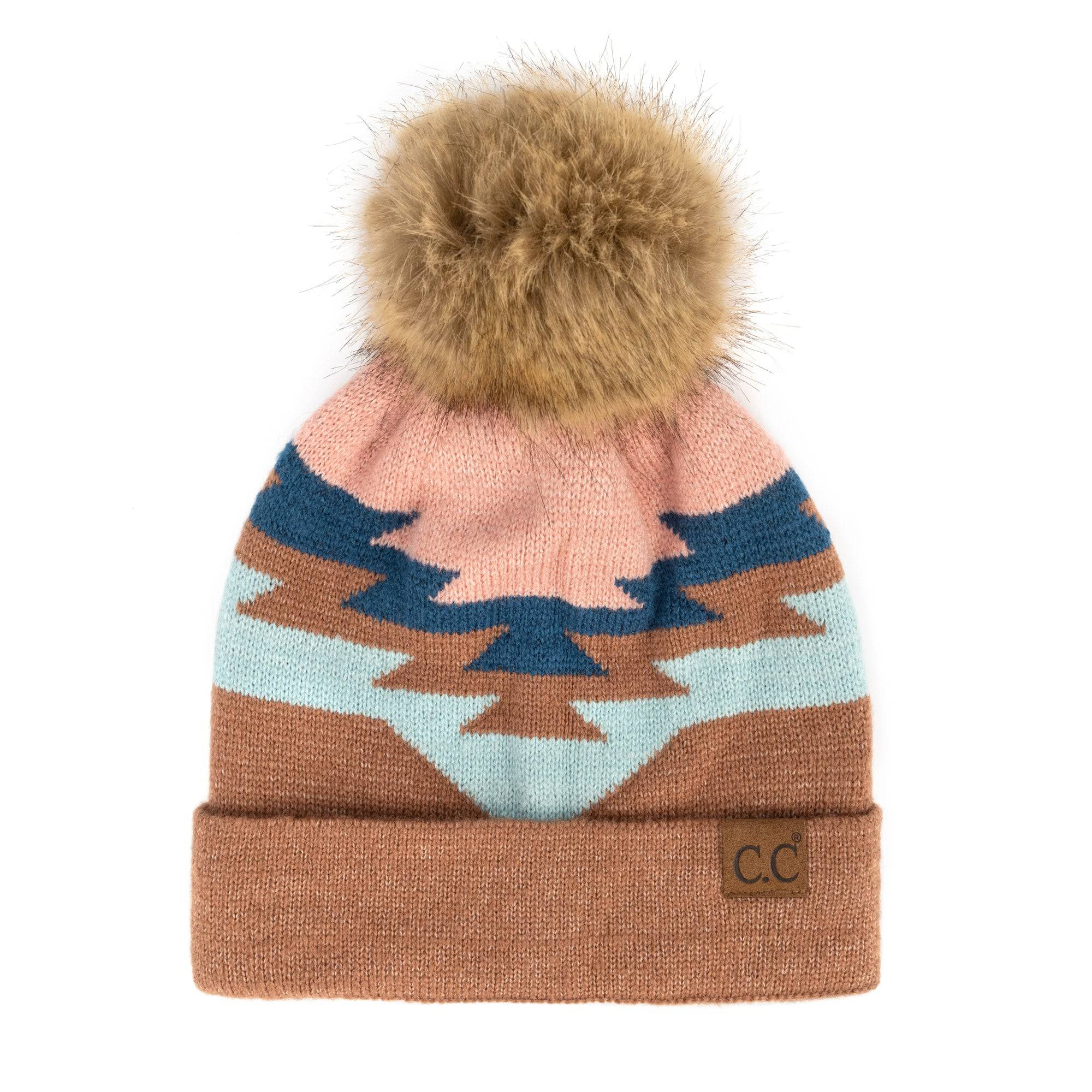 CC Beanie with Pom featuring a South Western Aztec pattern, showcasing its soft faux fur pom pom and vibrant design.