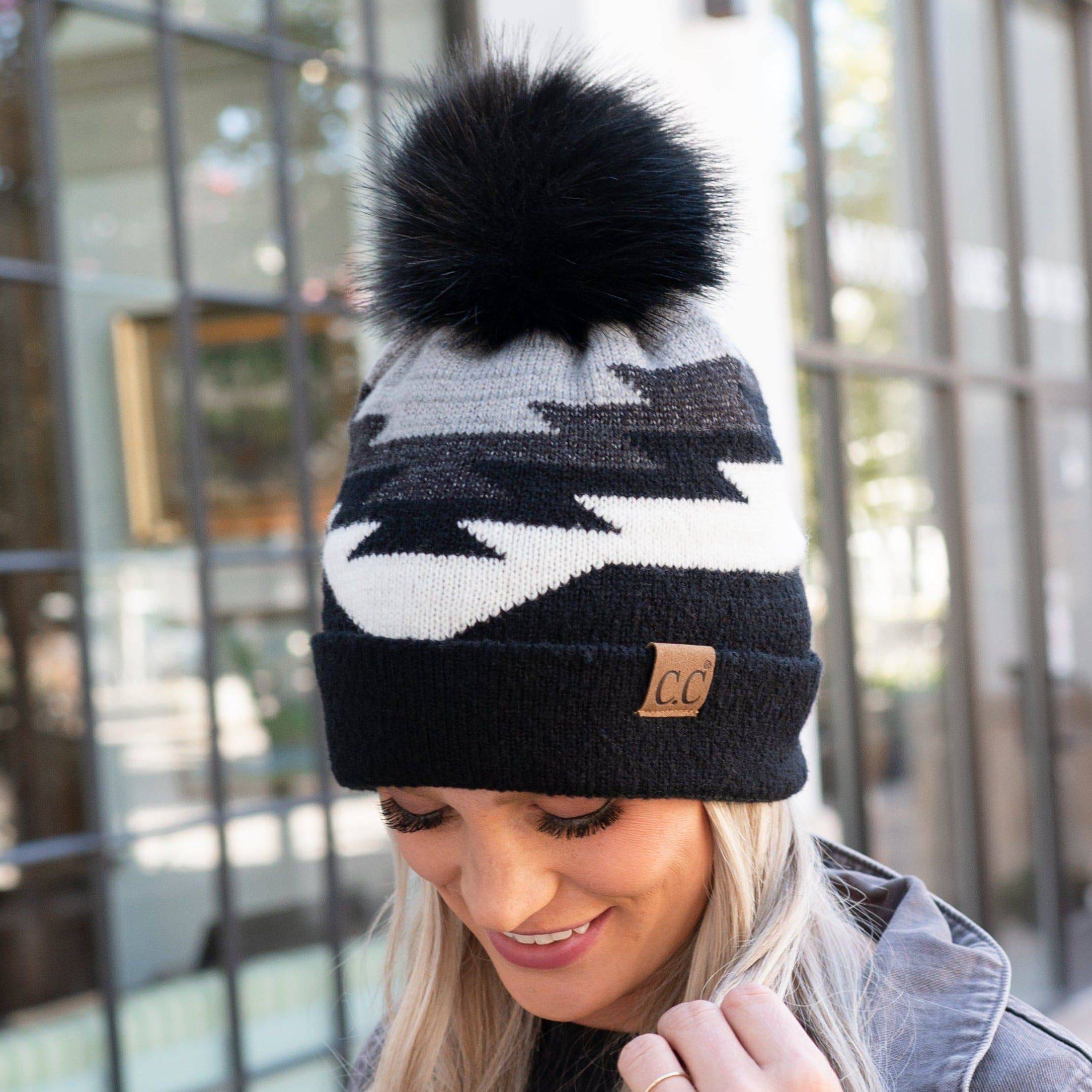 CC Beanie with Pom featuring a South Western Aztec pattern, showcasing its soft faux fur pom pom and vibrant design.