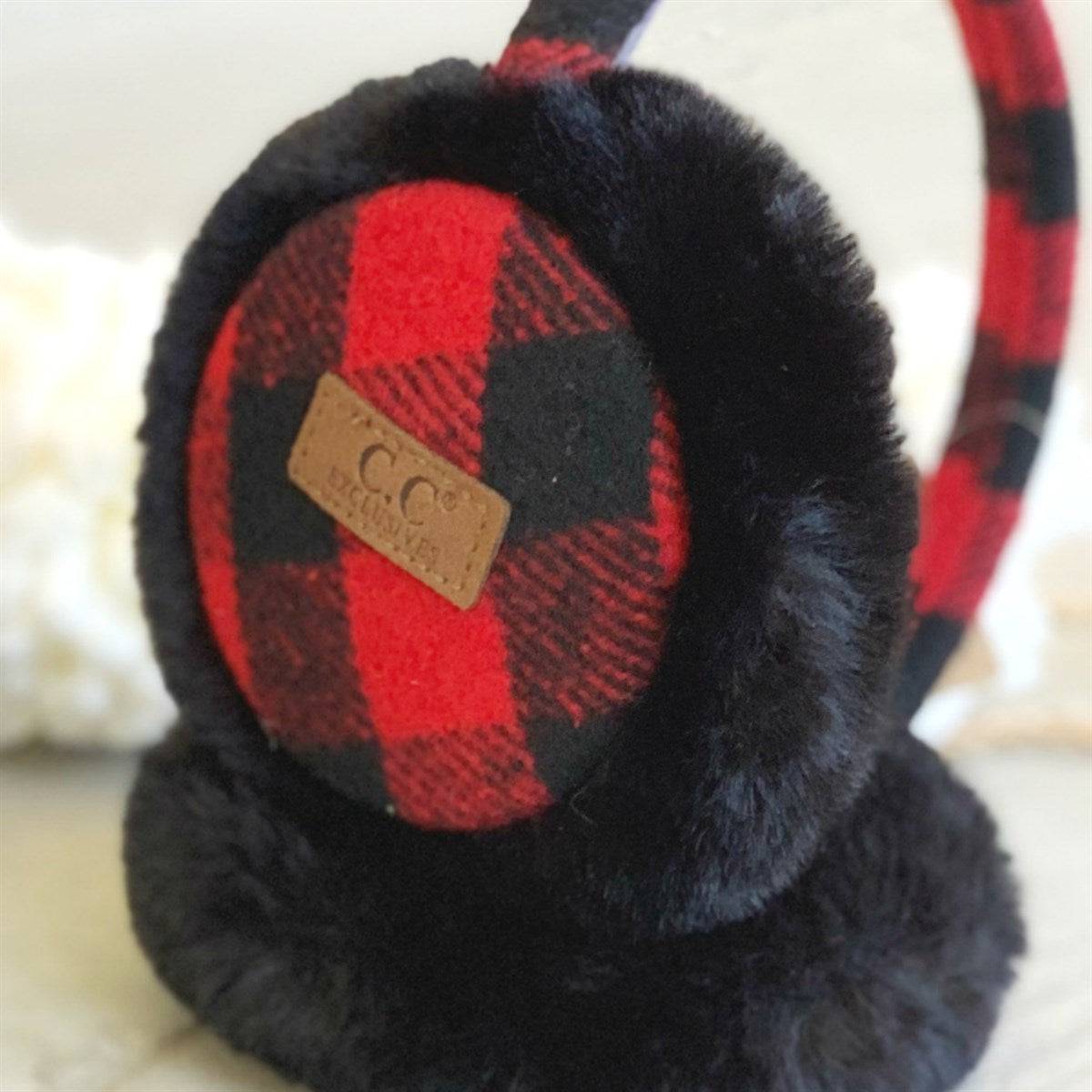 CC Buffalo Plaid Earmuffs with cozy sherpa lining, featuring adjustable fit and stylish buffalo plaid pattern.