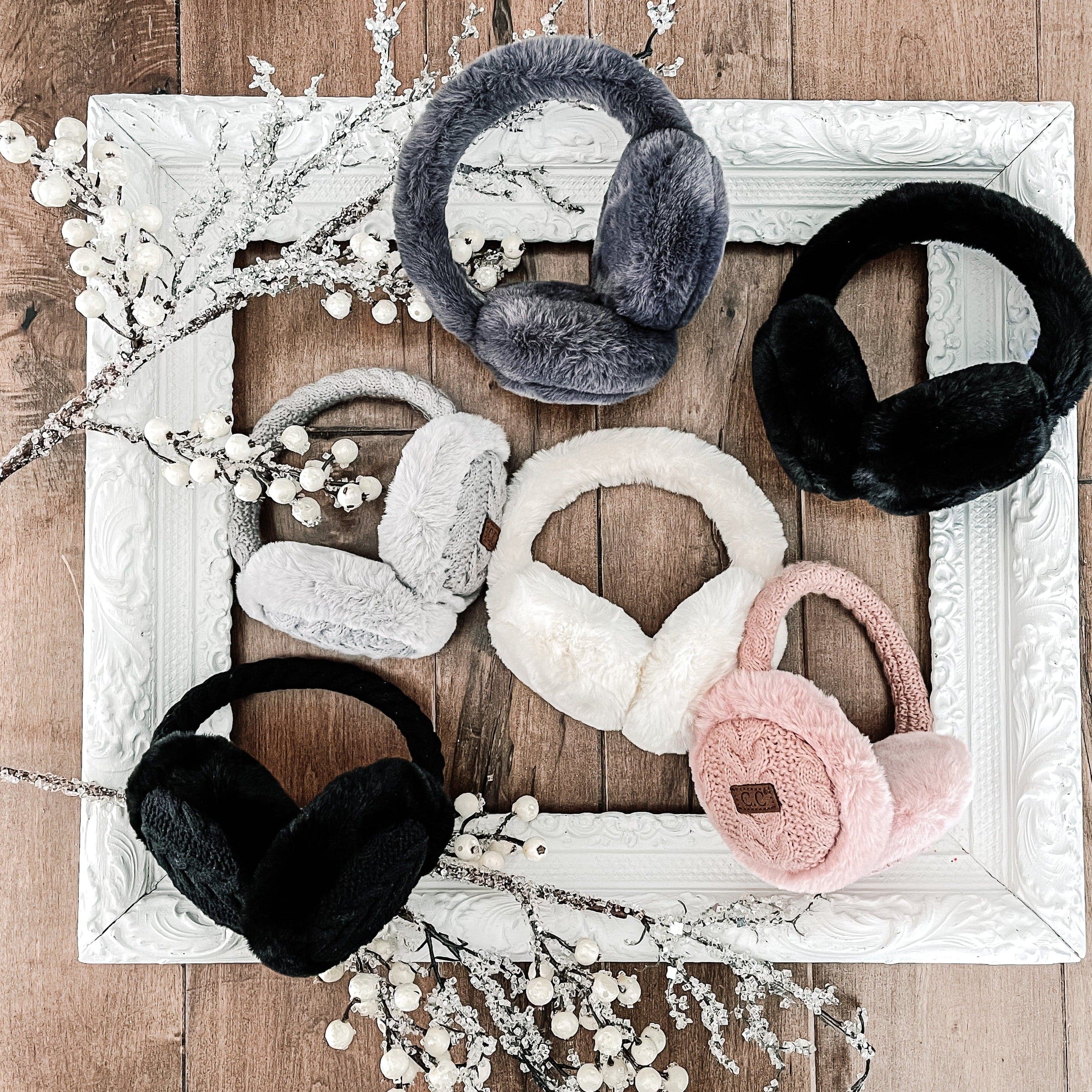 CC Cable Knit Earmuffs with cozy sherpa lining, adjustable fit, and stylish cable knit design in various colors.