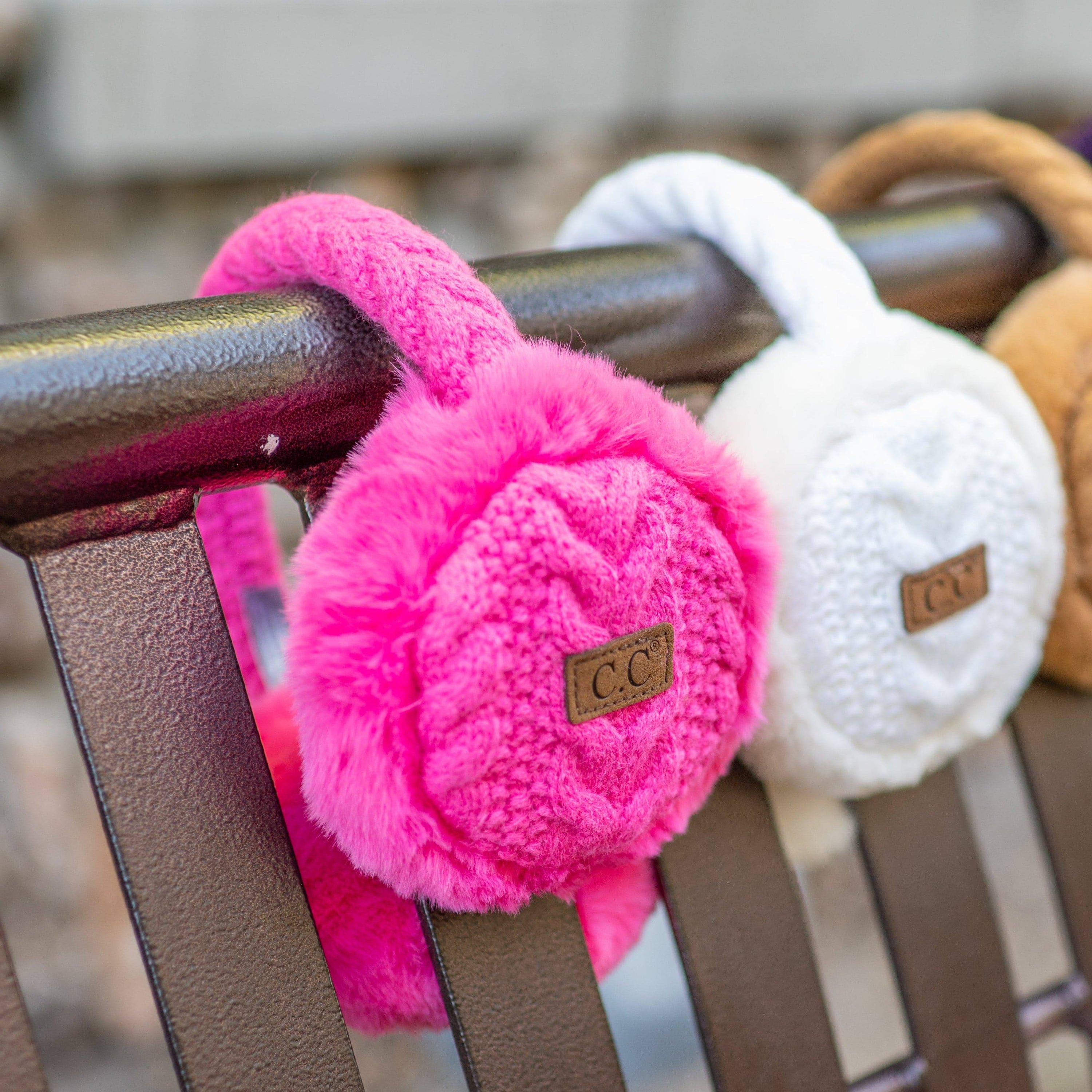 CC Cable Knit Earmuffs with cozy sherpa lining, adjustable fit, and stylish cable knit design in various colors.