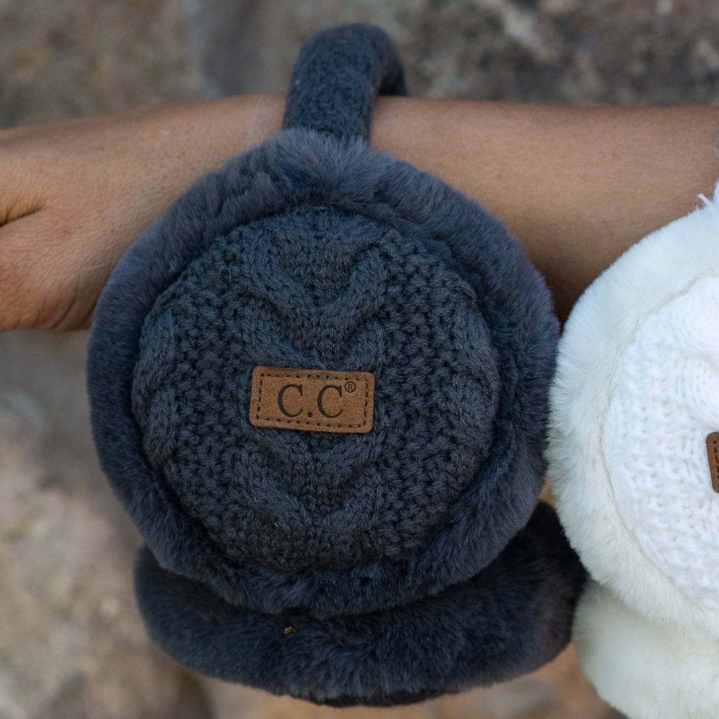 CC Cable Knit Earmuffs with cozy sherpa lining, adjustable fit, and stylish cable knit design in various colors.