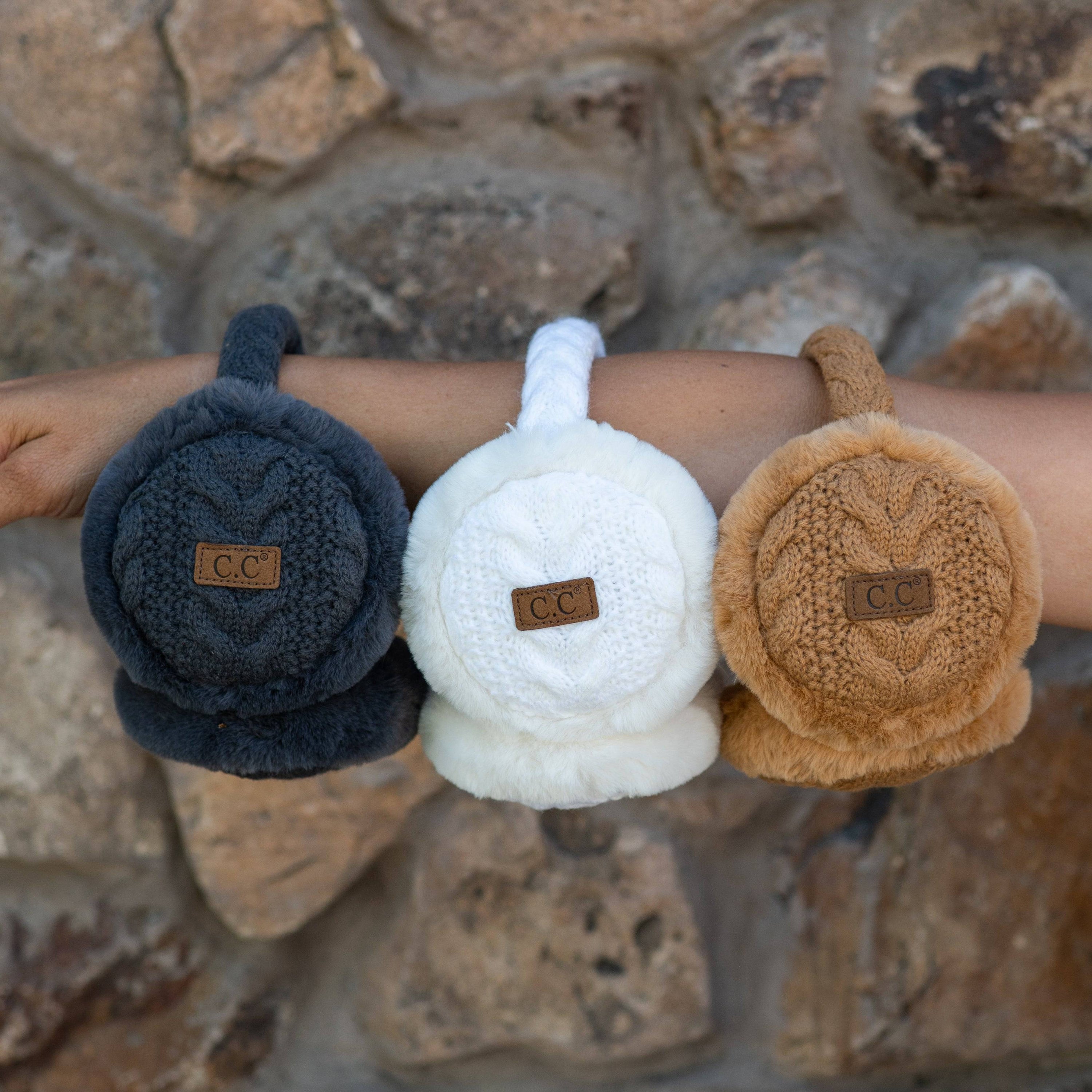 CC Cable Knit Earmuffs with cozy sherpa lining, adjustable fit, and stylish cable knit design in various colors.