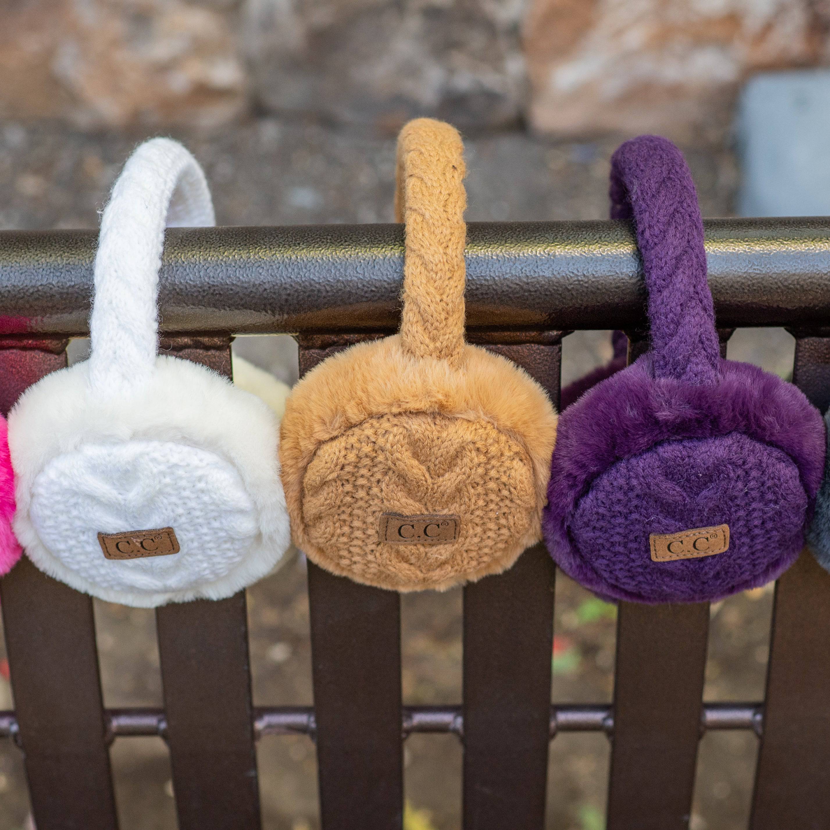 CC Cable Knit Earmuffs with cozy sherpa lining, adjustable fit, and stylish cable knit design in various colors.