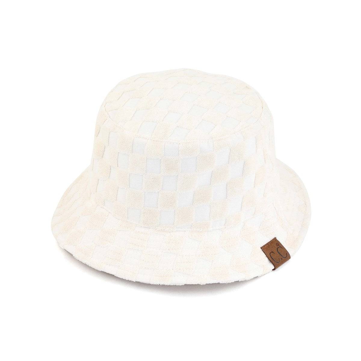 CC Checkered Terry Cloth Bucket hat featuring a stylish checkered pattern, adjustable strap, and lightweight terry cloth material.