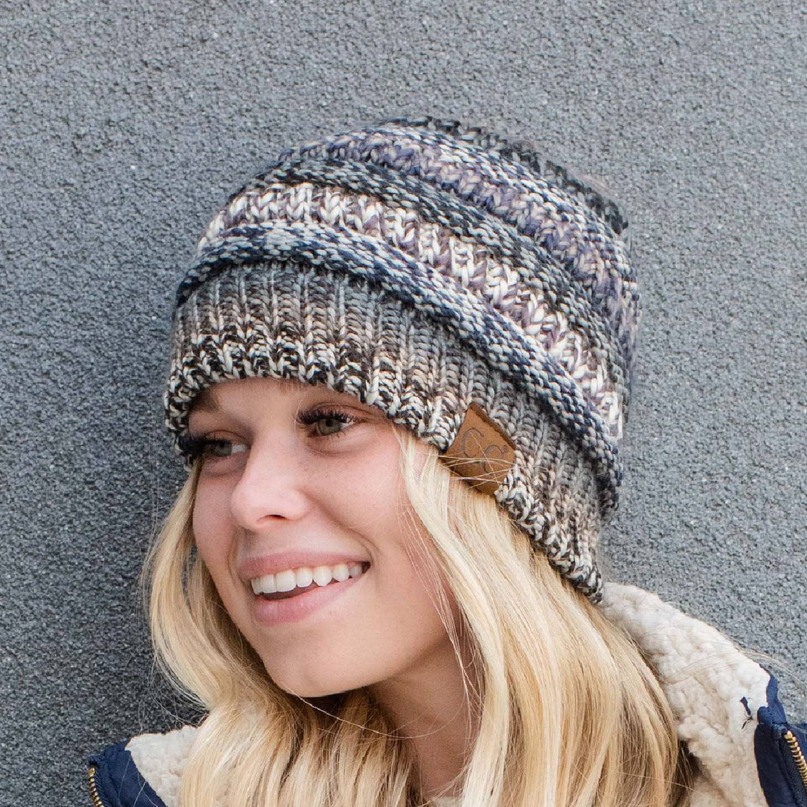 CC Comfy Striped Beanie featuring cable knit texture and multi-color yarn, perfect for cold weather.